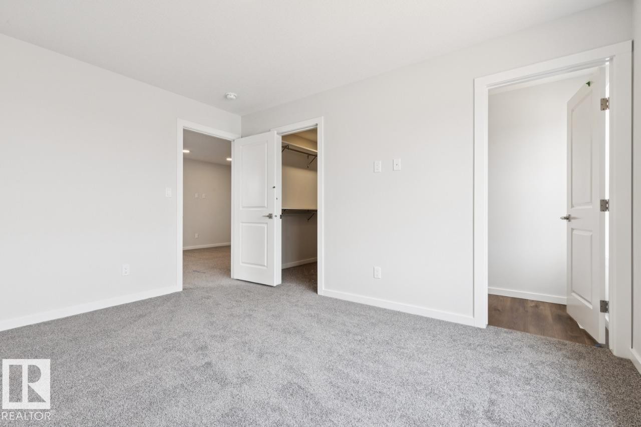 2482 Egret Loop Nw, Edmonton, AB - Indoor Photo Showing Other Room