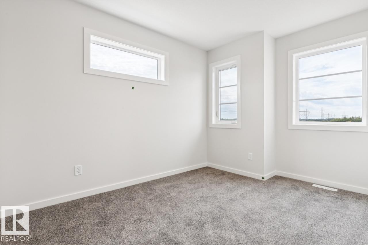 2482 Egret Loop Nw, Edmonton, AB - Indoor Photo Showing Other Room
