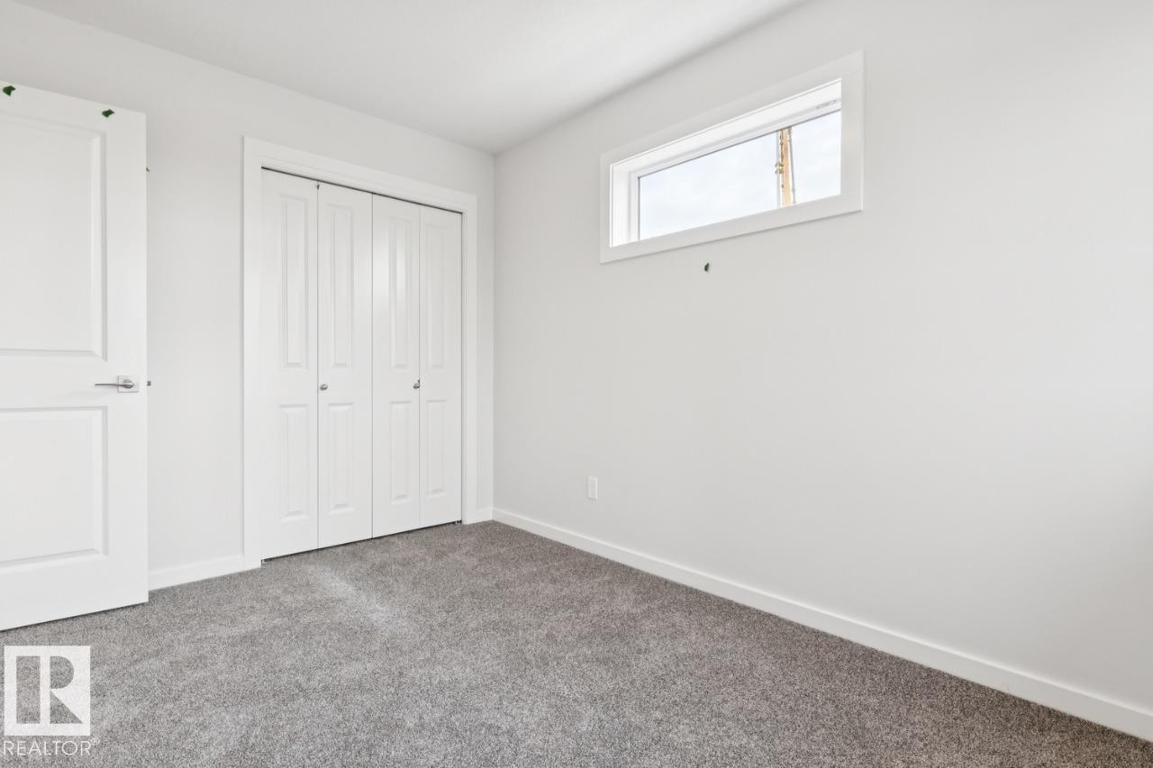2482 Egret Loop Nw, Edmonton, AB - Indoor Photo Showing Other Room