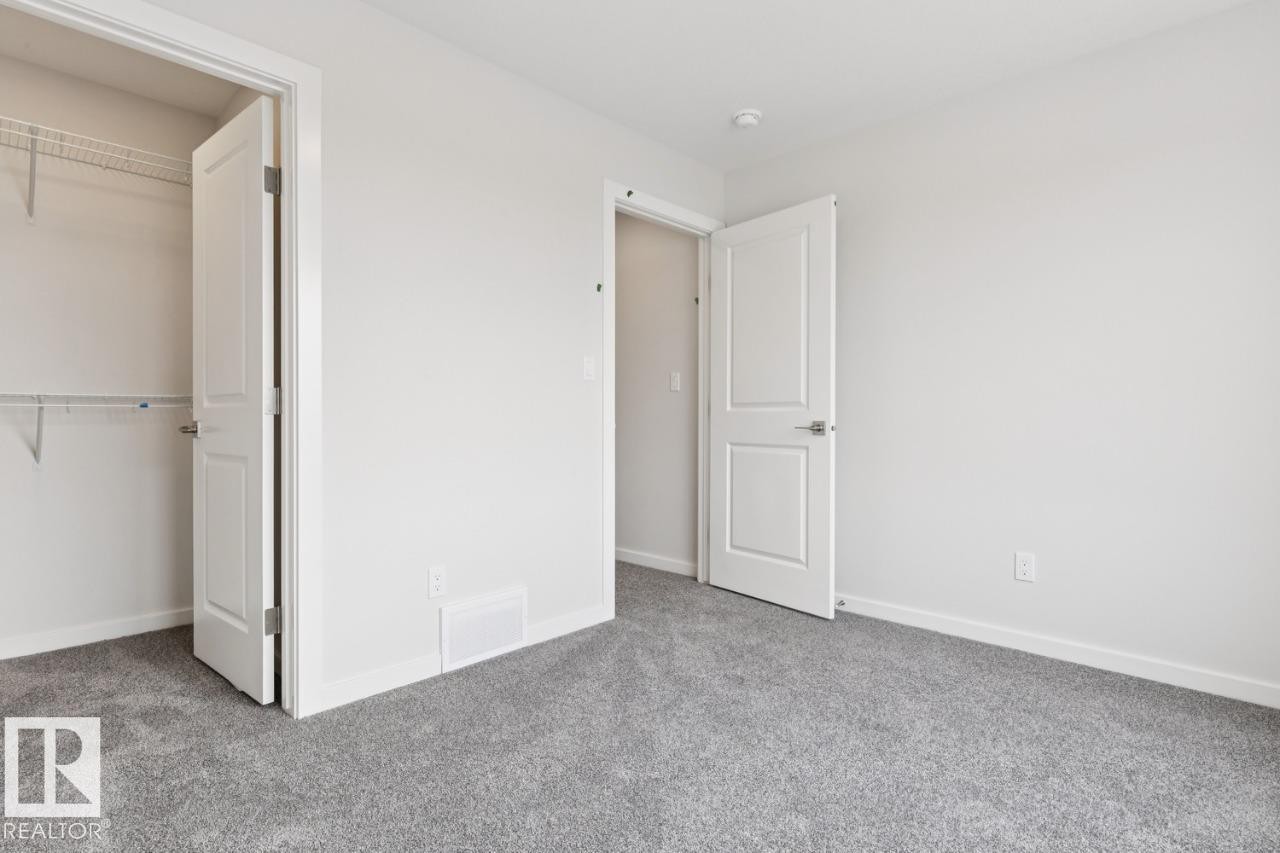 2482 Egret Loop Nw, Edmonton, AB - Indoor Photo Showing Other Room