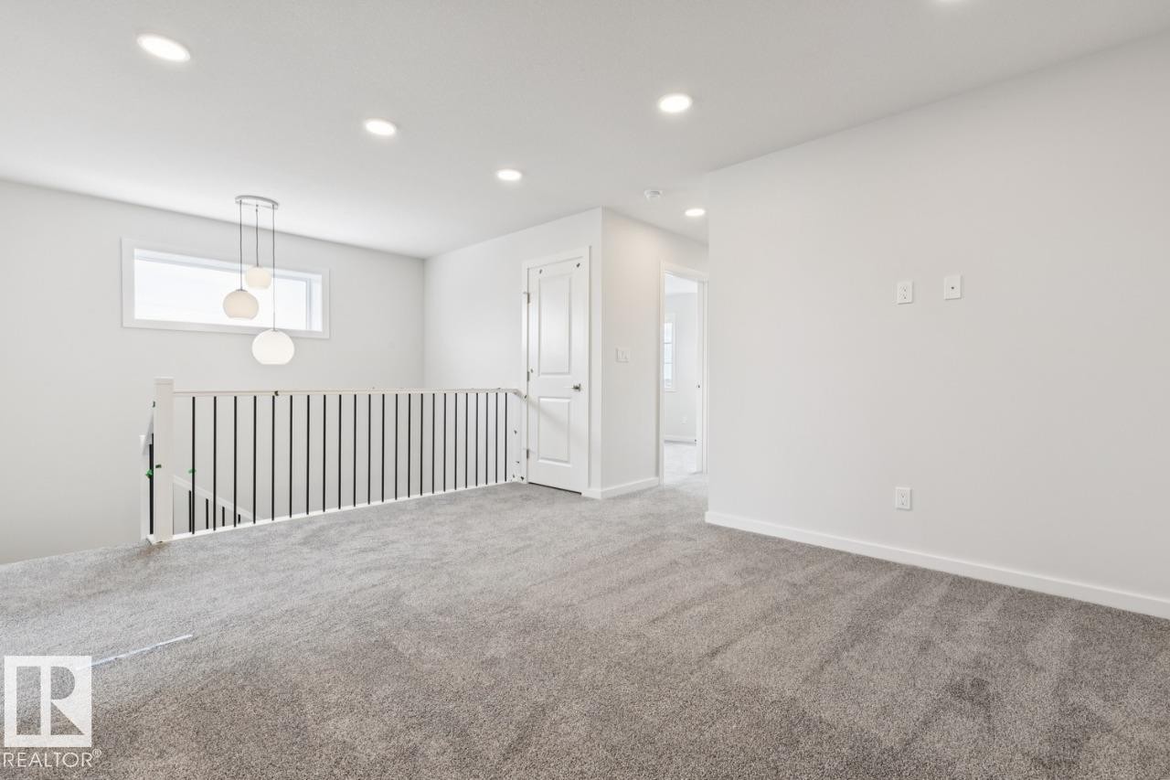 2482 Egret Loop Nw, Edmonton, AB - Indoor Photo Showing Other Room
