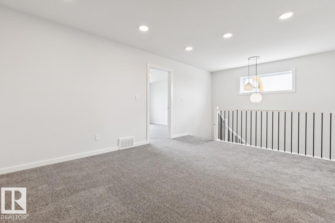 2482 Egret Loop Nw, Edmonton, AB - Indoor Photo Showing Other Room