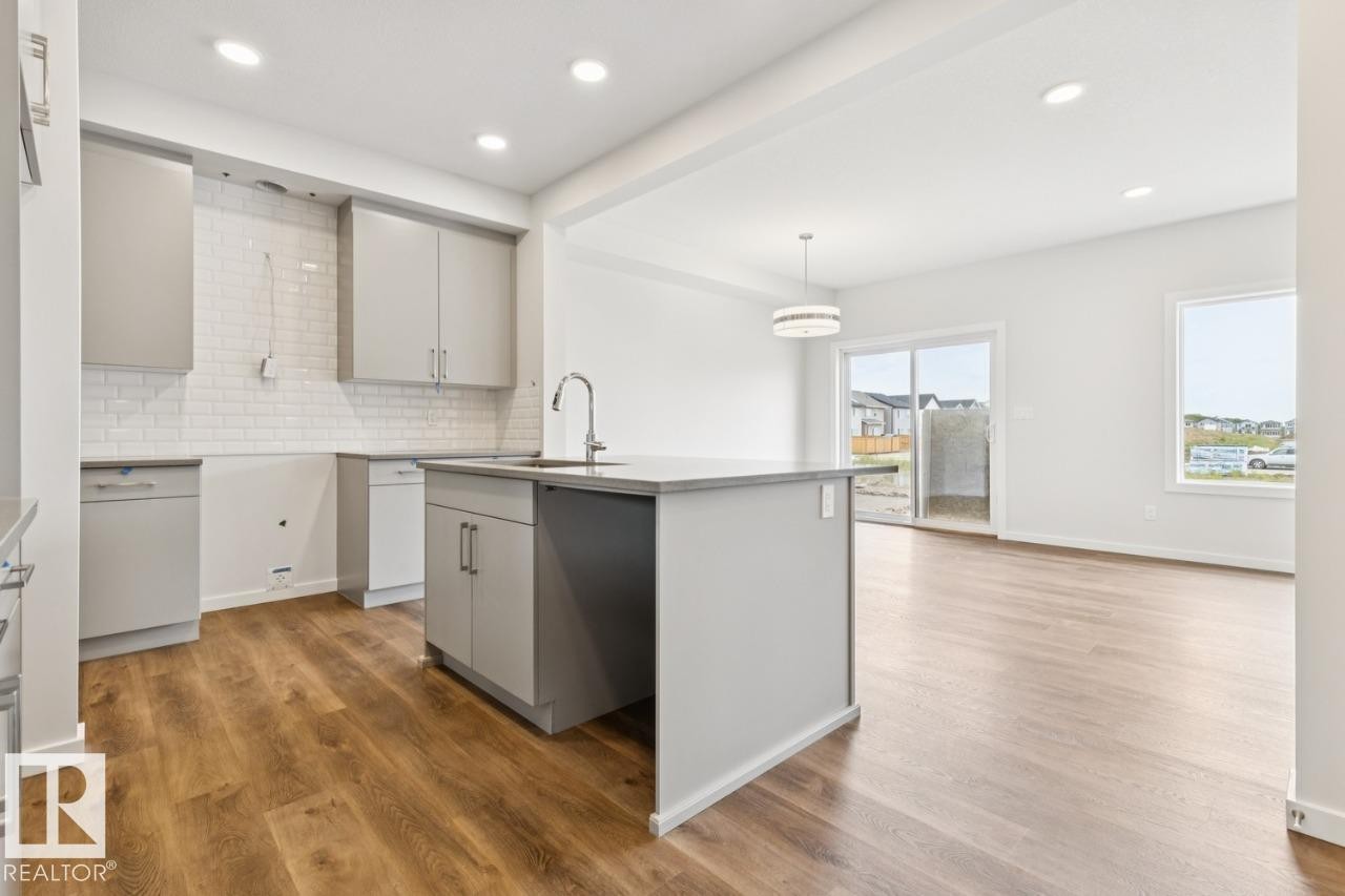 2482 Egret Loop Nw, Edmonton, AB - Indoor Photo Showing Kitchen With Upgraded Kitchen