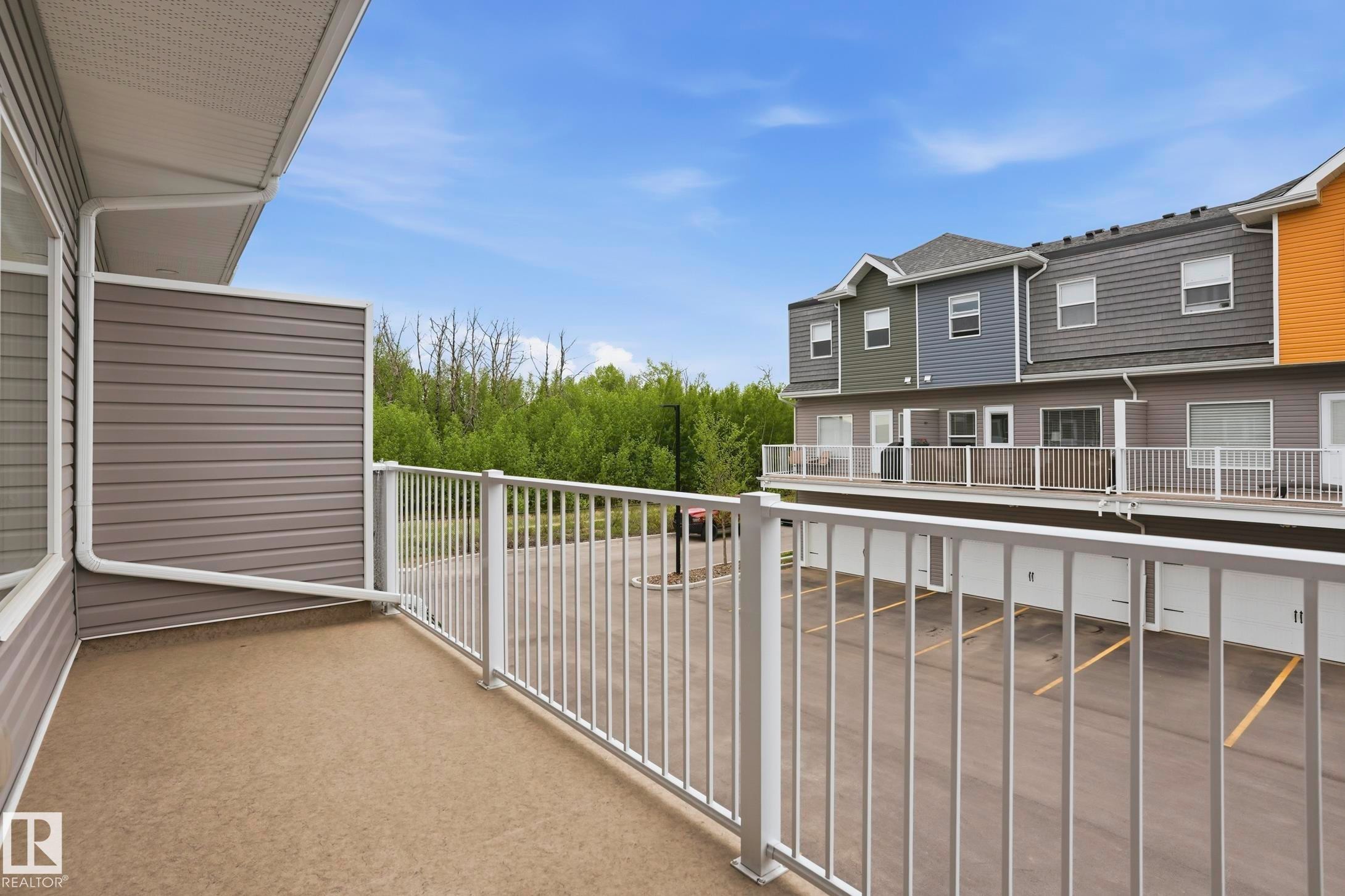 Private balcony space featuring a concrete floor and white railing - 36 150 Everitt Dr, St. Albert, AB - Outdoor With Balcony With Exterior