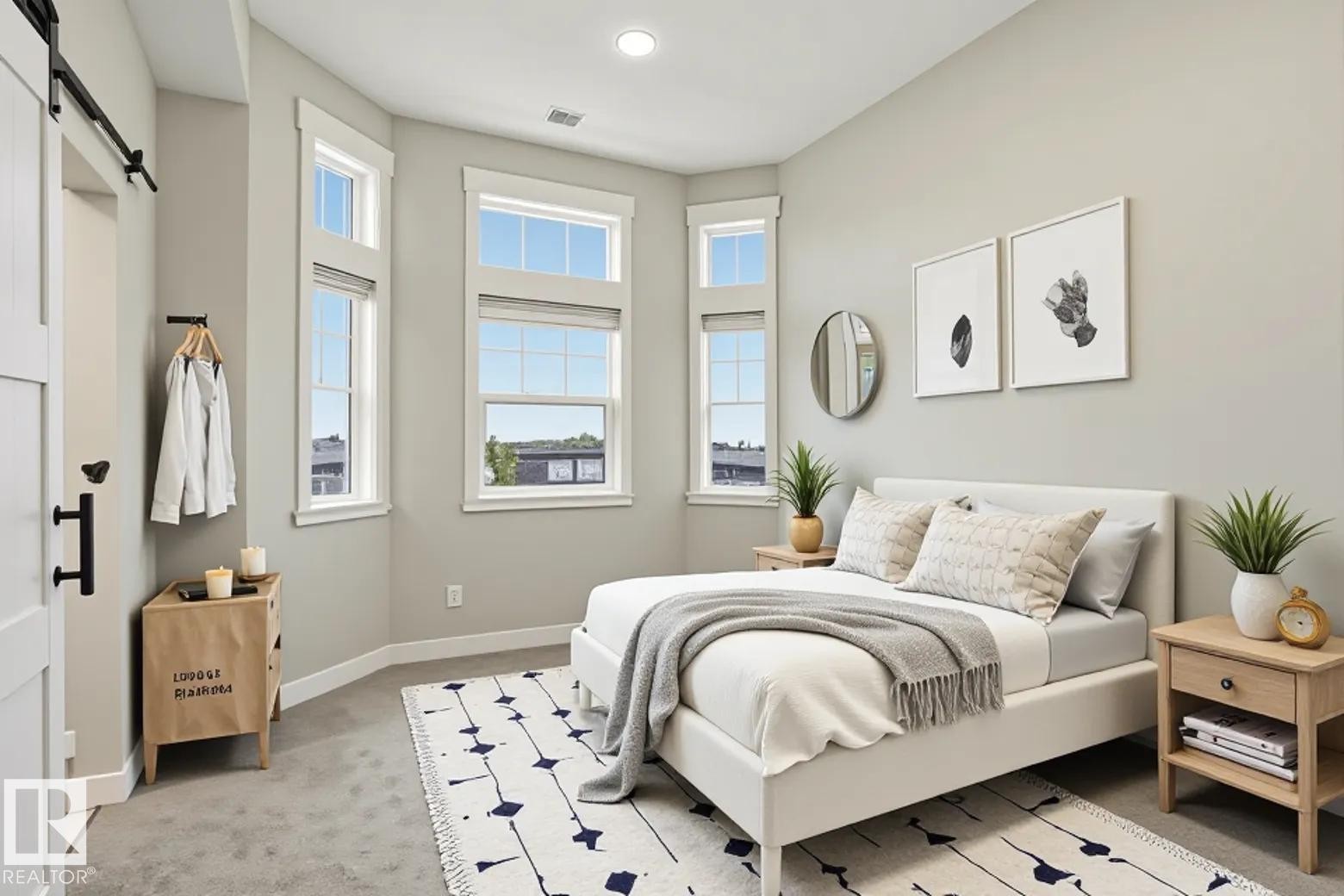 Room featuring a corner window configuration, recessed lighting, and soft gray wall tones - 36 150 Everitt Dr, St. Albert, AB - Indoor Photo Showing Bedroom