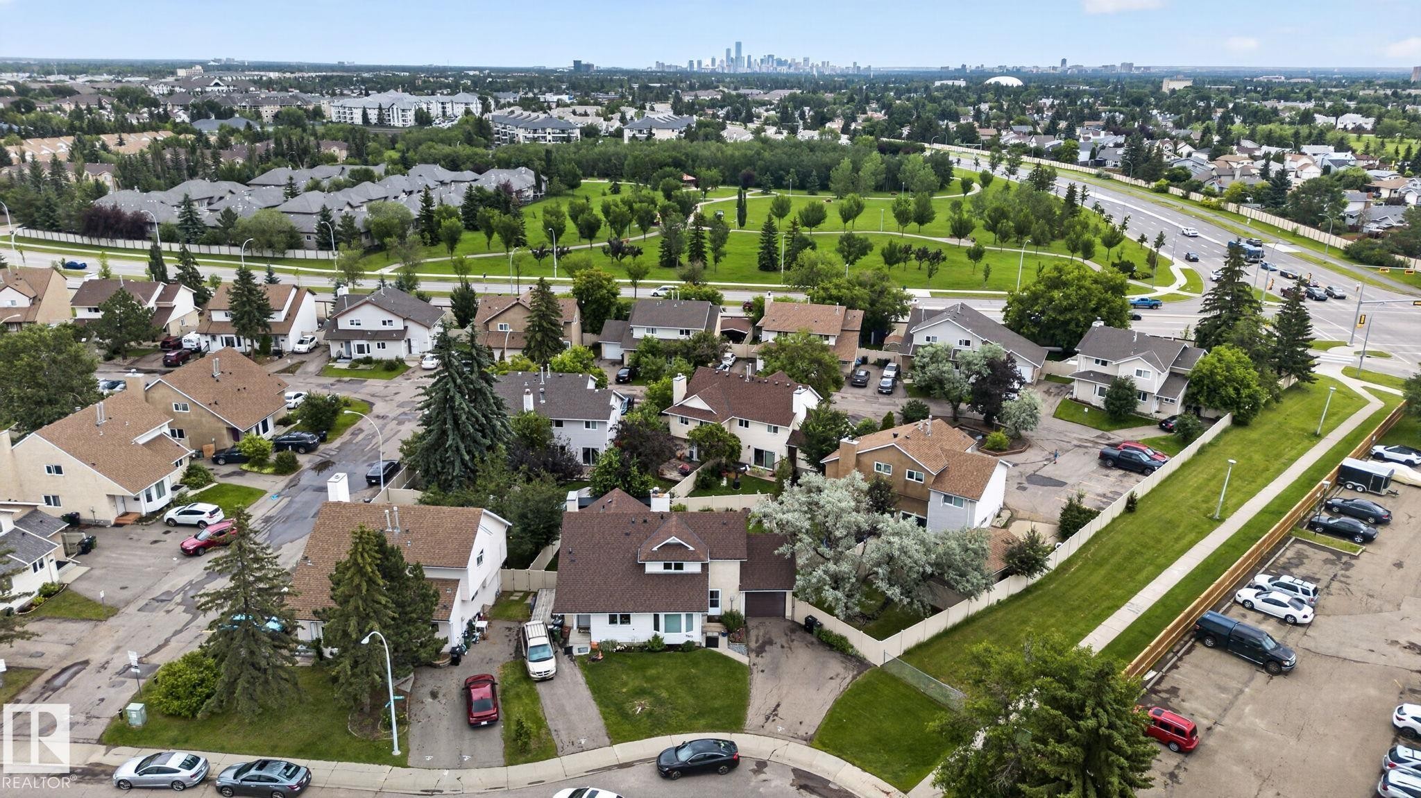 Aerial depiction of a residential neighborhood featuring detached properties with various roof styles - 9503 180A Street Nw, Edmonton, AB - Outdoor With View