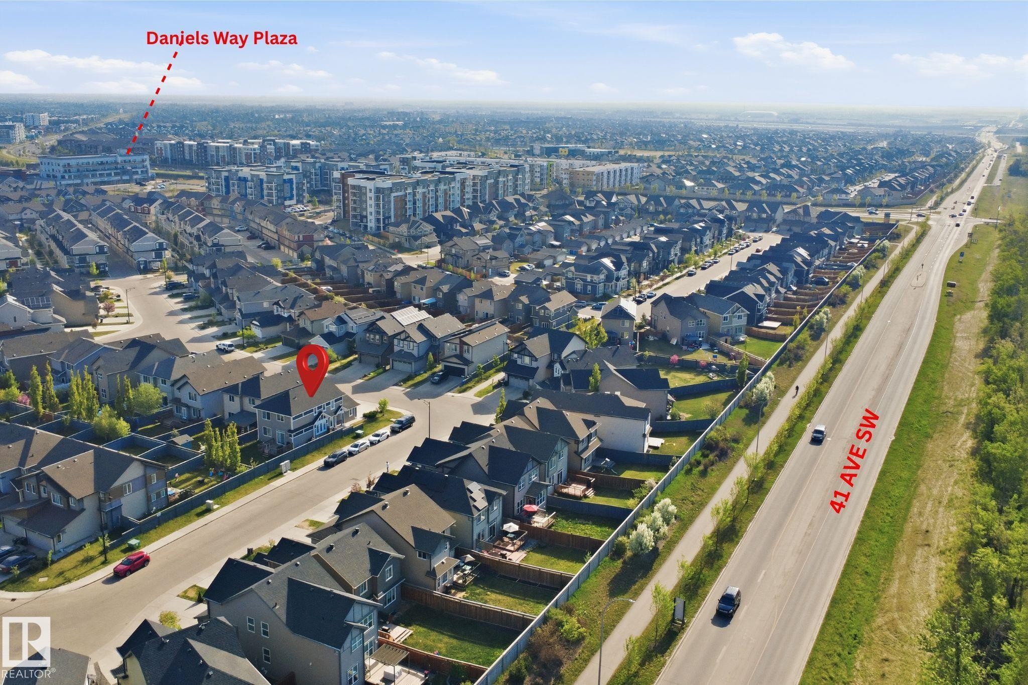Aerial perspective showcasing a residential neighborhood with Daniels Way Plaza and 41 Ave SW - 1234 Daniels Crescent, Edmonton, AB - Outdoor With View
