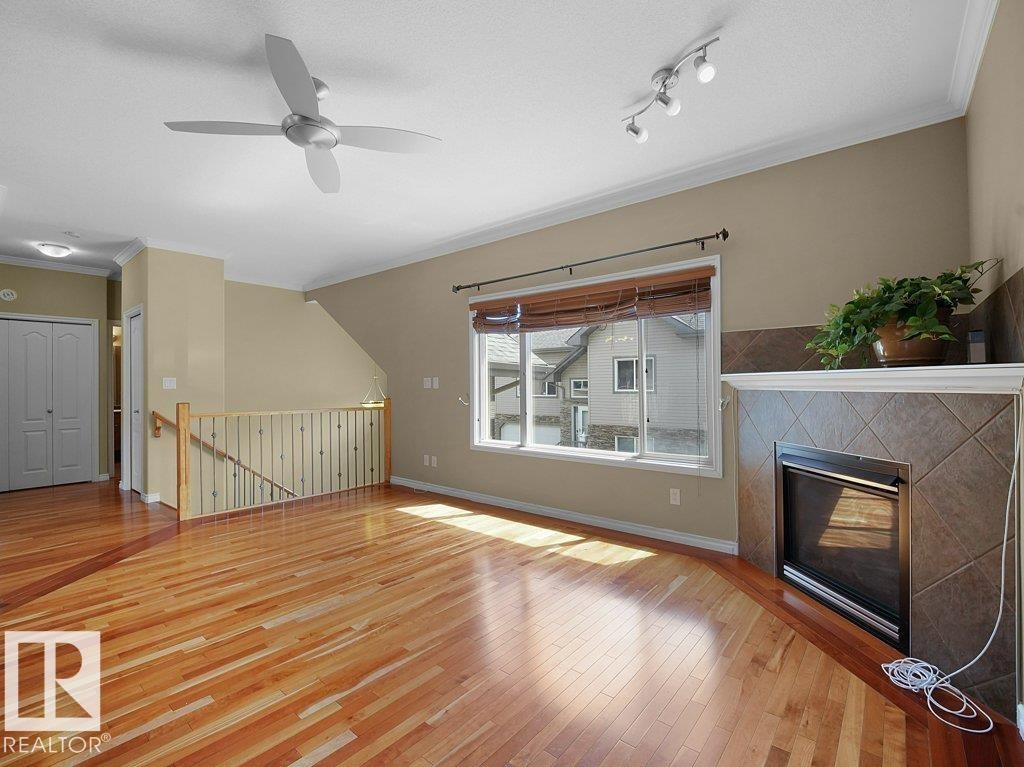 #30 17715 96 Av Nw, Edmonton, AB - Indoor With Fireplace
