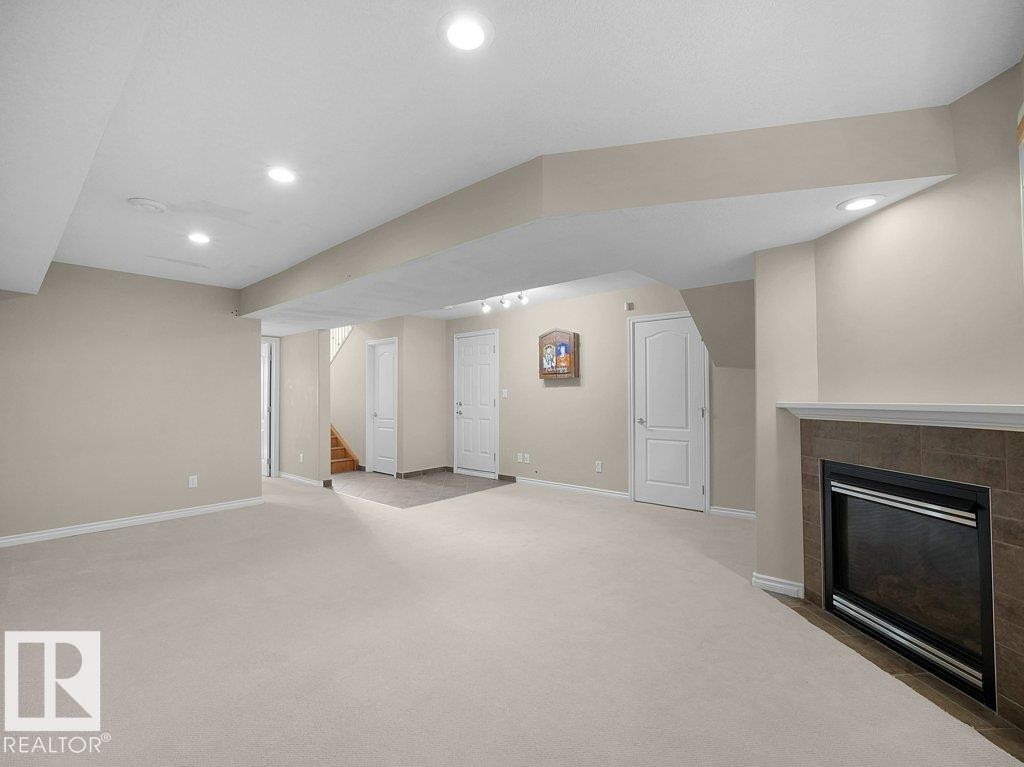 #30 17715 96 Av Nw, Edmonton, AB - Indoor With Fireplace