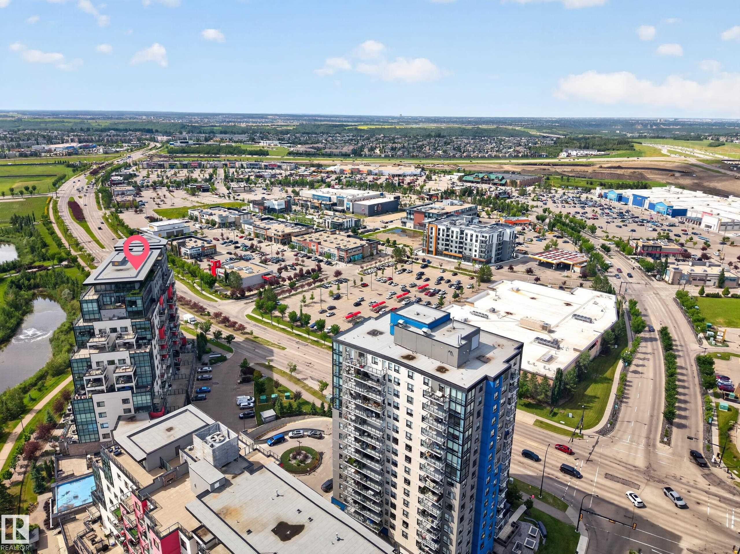 High-rise residential building featuring multiple balconies and a flat roofline - 706 5151 Windermere Boulevard, Edmonton, AB