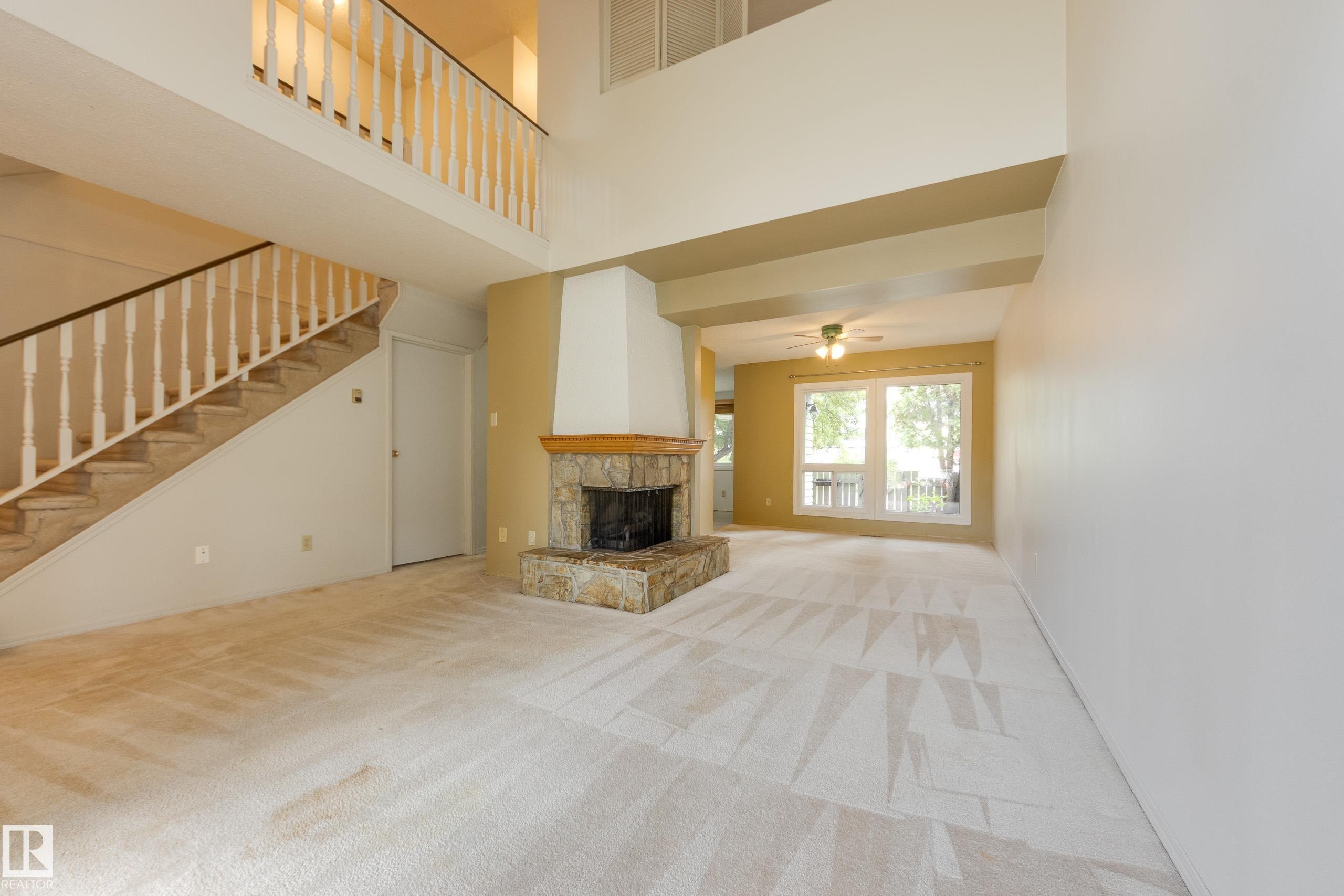 5441 Hill View Crescent Nw, Edmonton, AB - Indoor Photo Showing Other Room With Fireplace