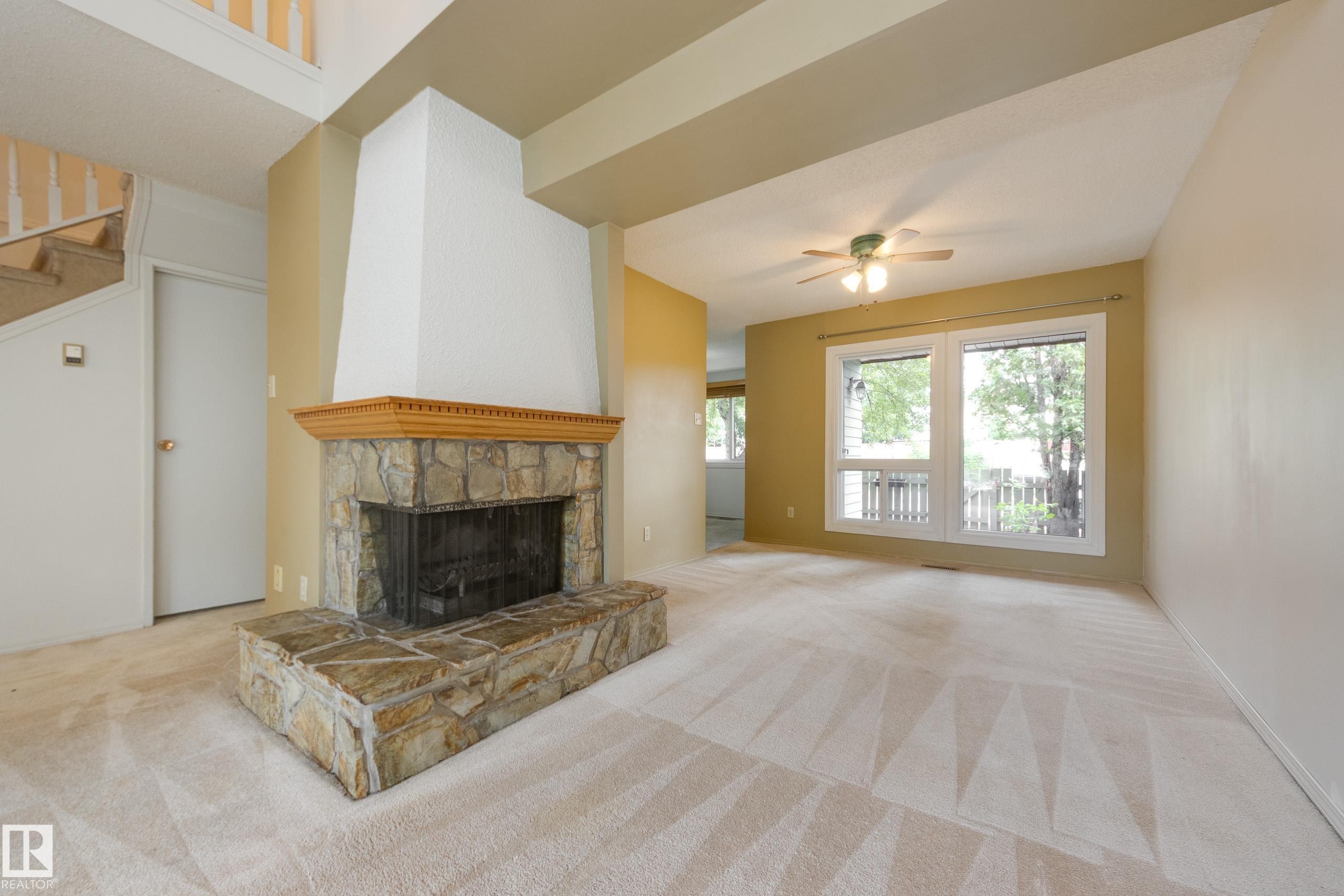5441 Hill View Crescent Nw, Edmonton, AB - Indoor Photo Showing Living Room With Fireplace