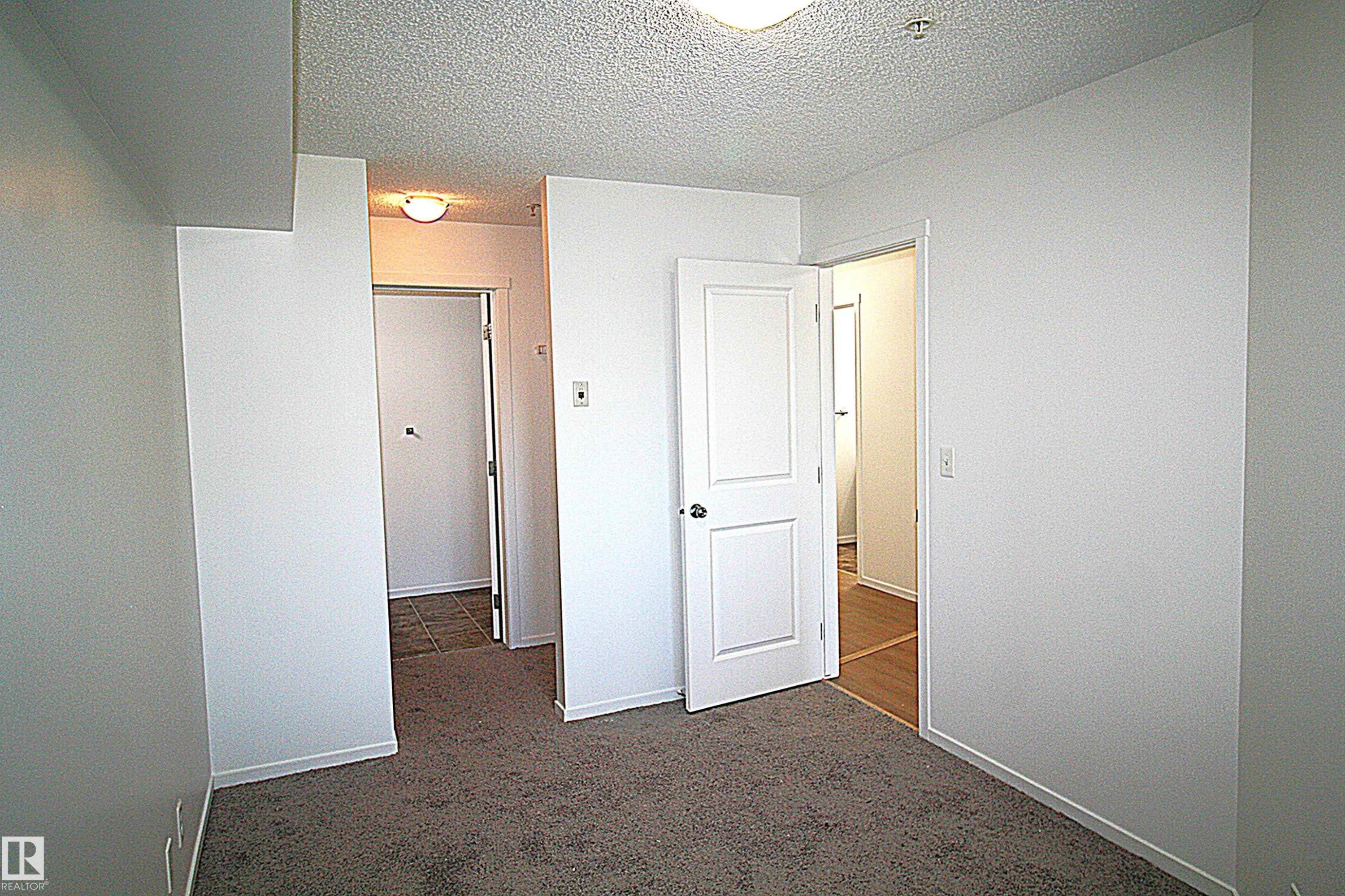 #316 5810 Mullen Pl Nw, Edmonton, AB - Indoor Photo Showing Other Room