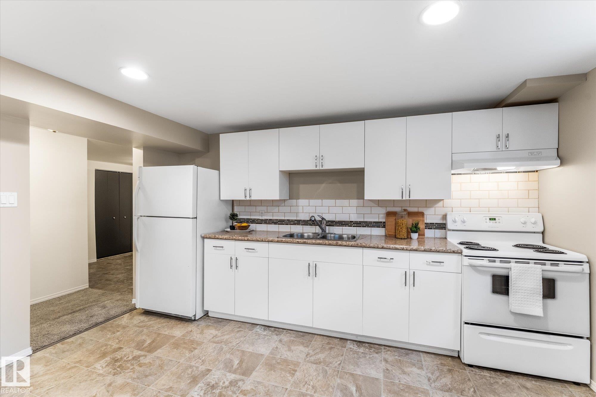 8911 149 Street, Edmonton, AB - Indoor Photo Showing Kitchen With Double Sink