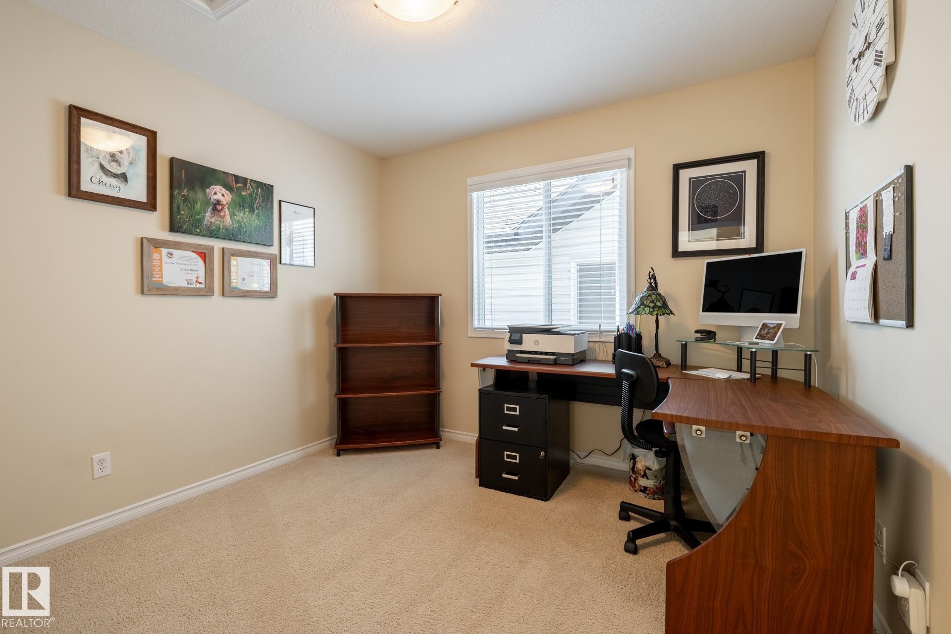Carpeted room with a built-in window and light-toned walls - 5820 7 Avenue Sw, Edmonton, AB - Indoor Photo Showing Office