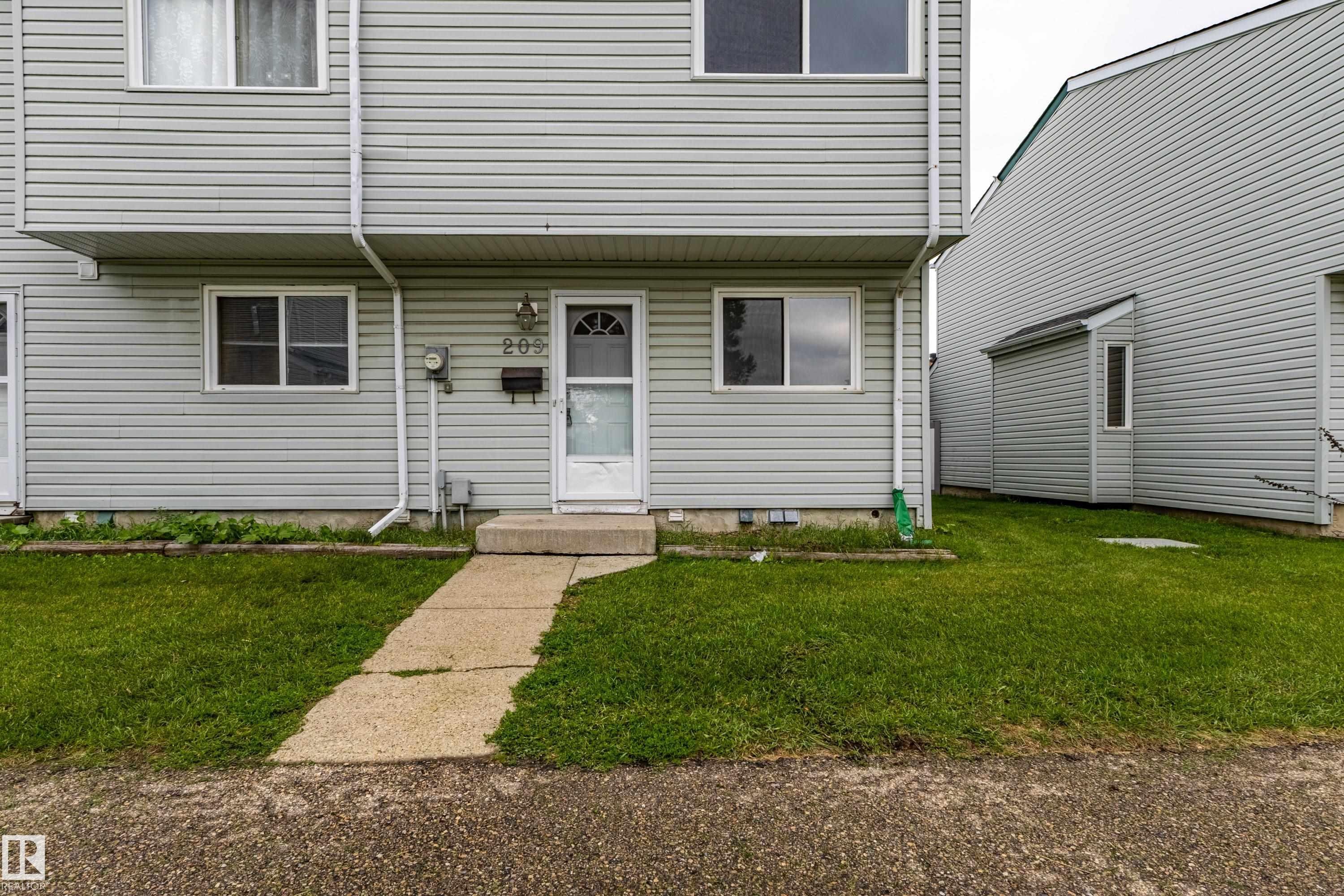 Exterior entry - 209 Dickinsfield Court Nw, Edmonton, AB