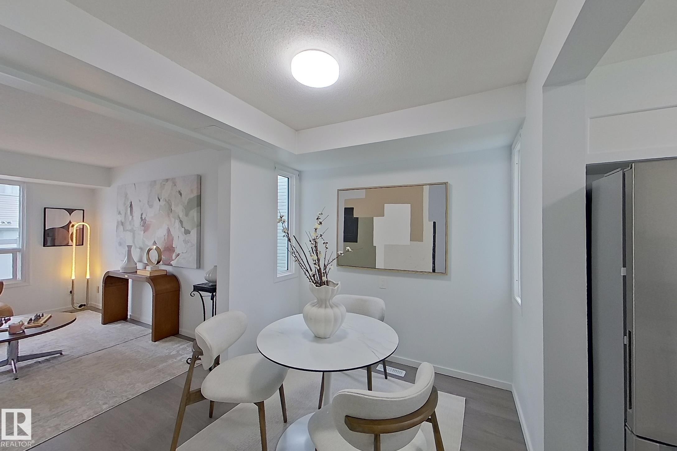 Dining area - 209 Dickinsfield Court Nw, Edmonton, AB