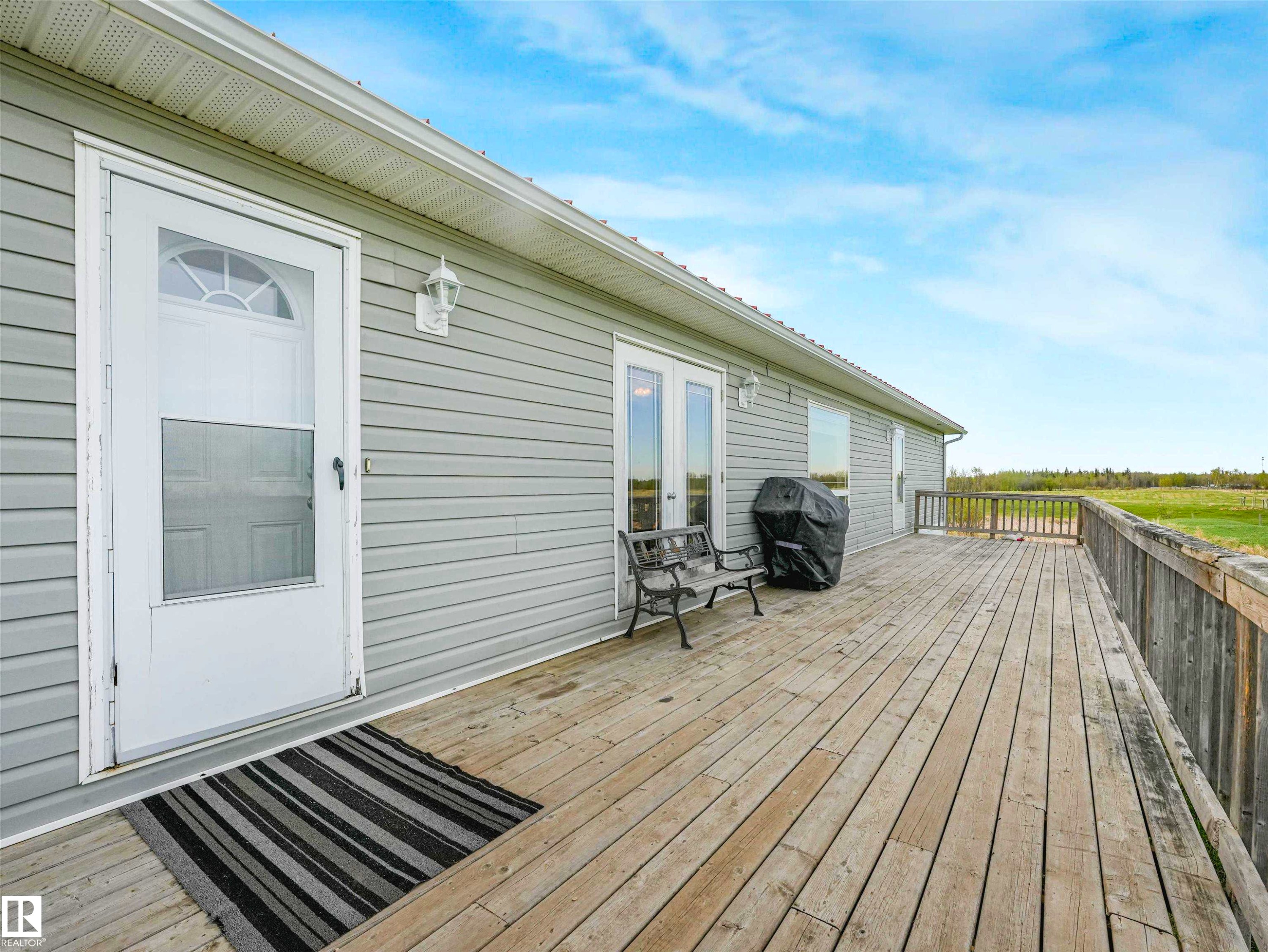 Image quality insufficient for description - 57016 Range Road 13, Rural Barrhead County, AB - Outdoor With Deck Patio Veranda With Exterior