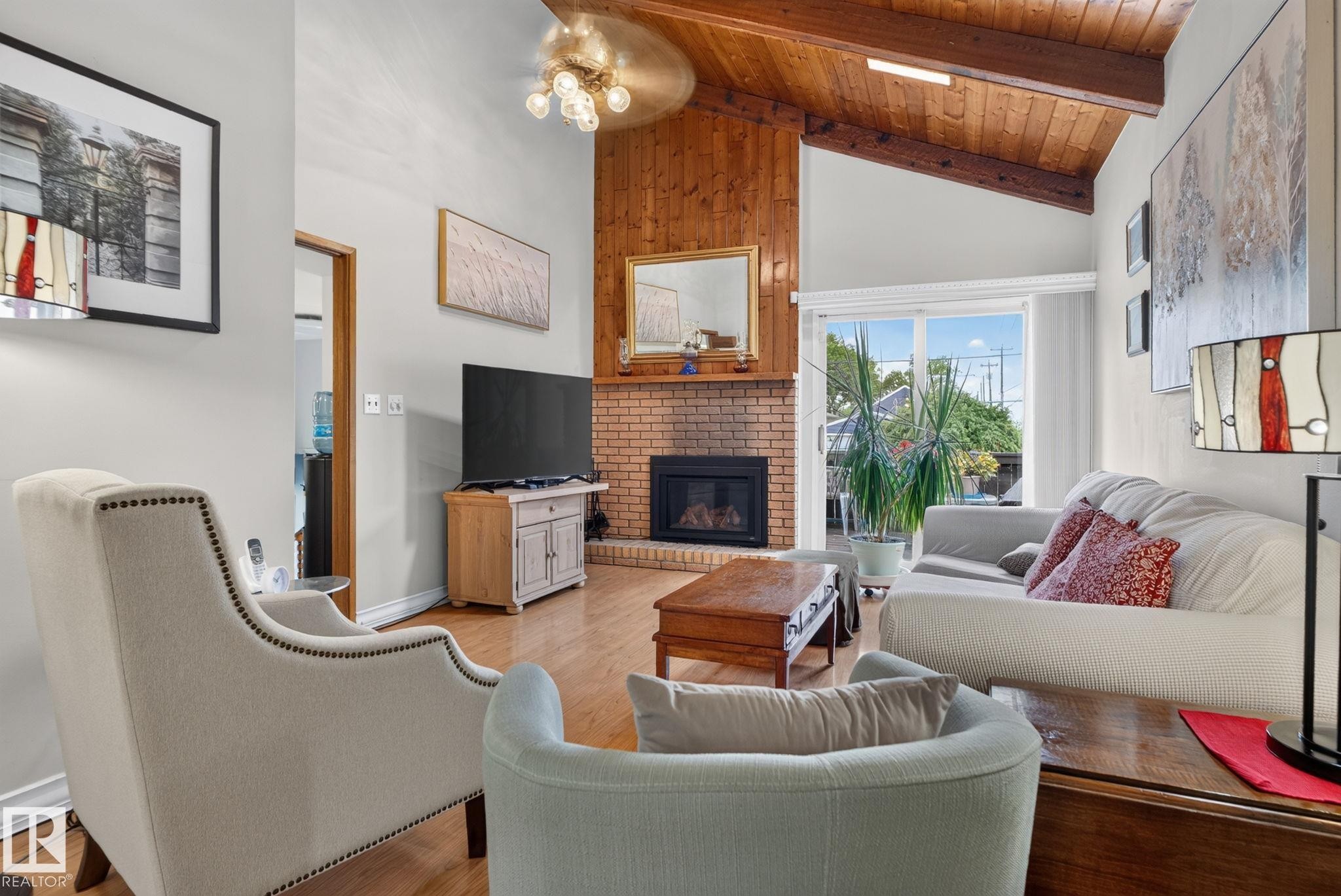 Vaulted wood-paneled ceiling with exposed beams - 12703 122 Street Nw, Edmonton, AB