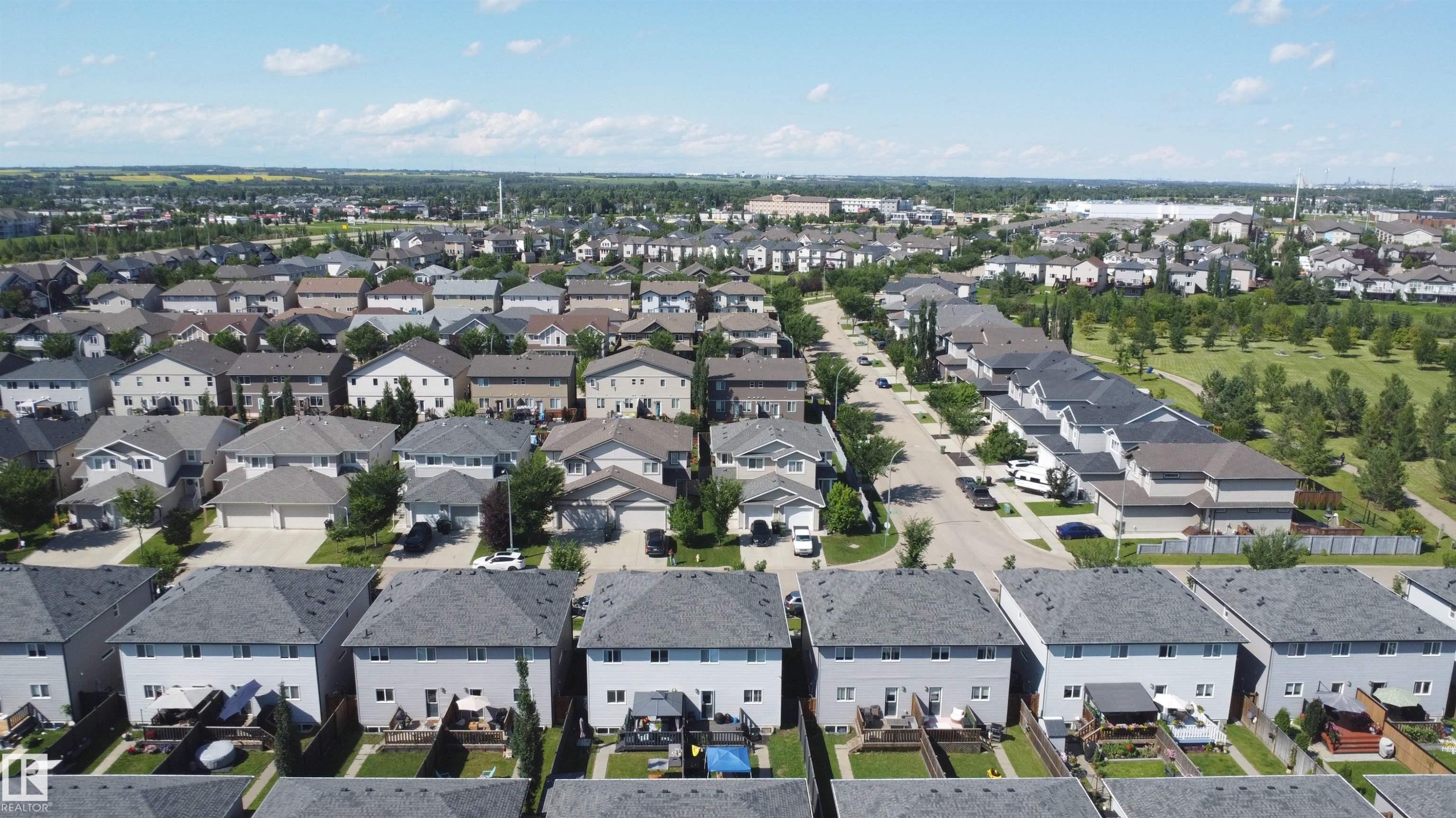 Residential community with consistent architectural styling - 187 Radcliffe Wynd, Fort Saskatchewan, AB - Outdoor With View