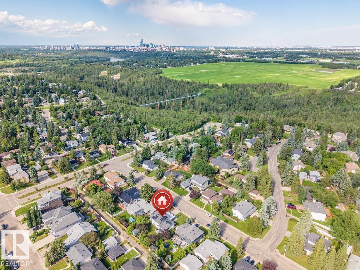 Aerial perspective of a developed residential neighborhood with mature trees - 5212 142 Street Nw, Edmonton, AB