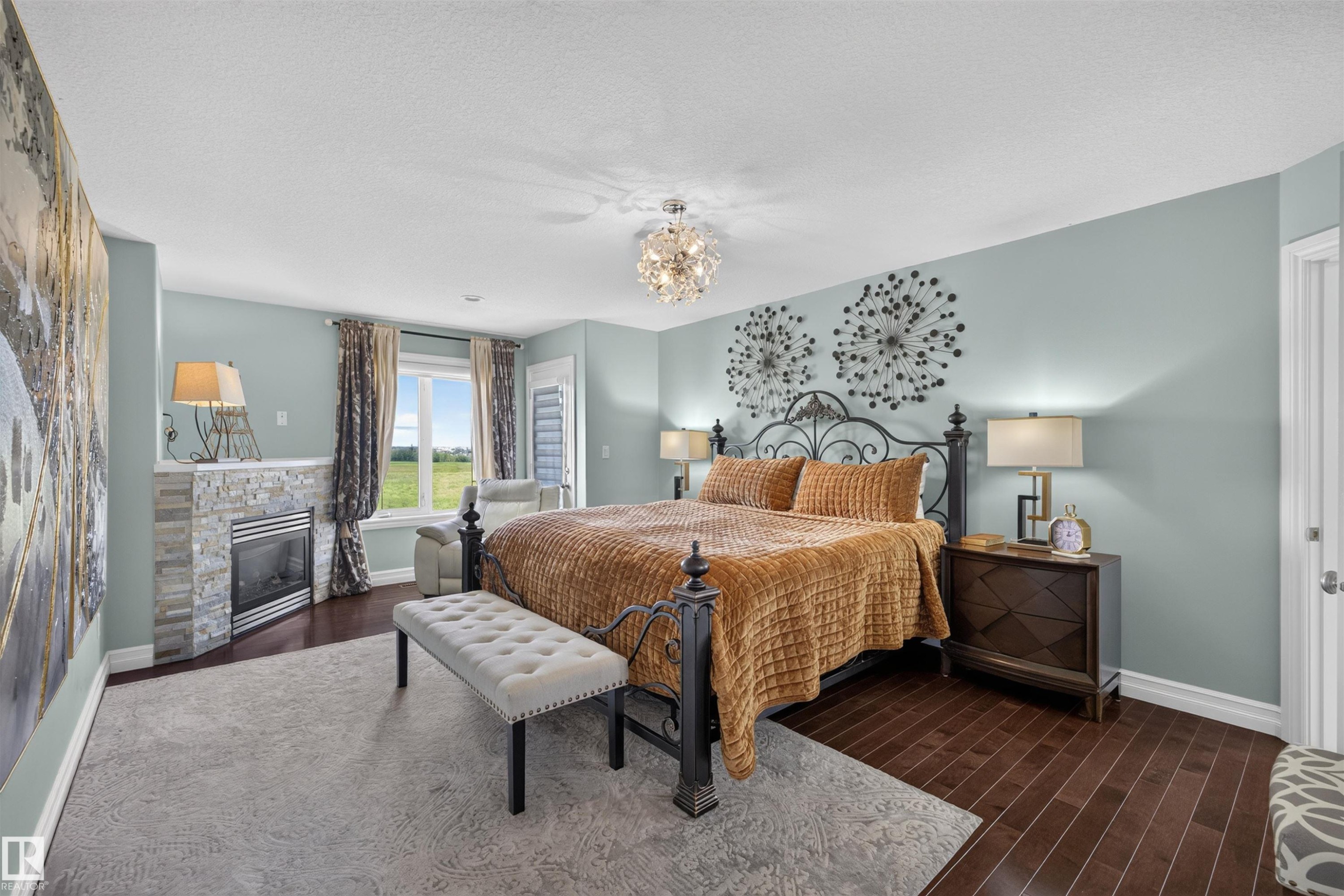 1751 Haswell Cove Nw, Edmonton, AB - Indoor Photo Showing Bedroom With Fireplace