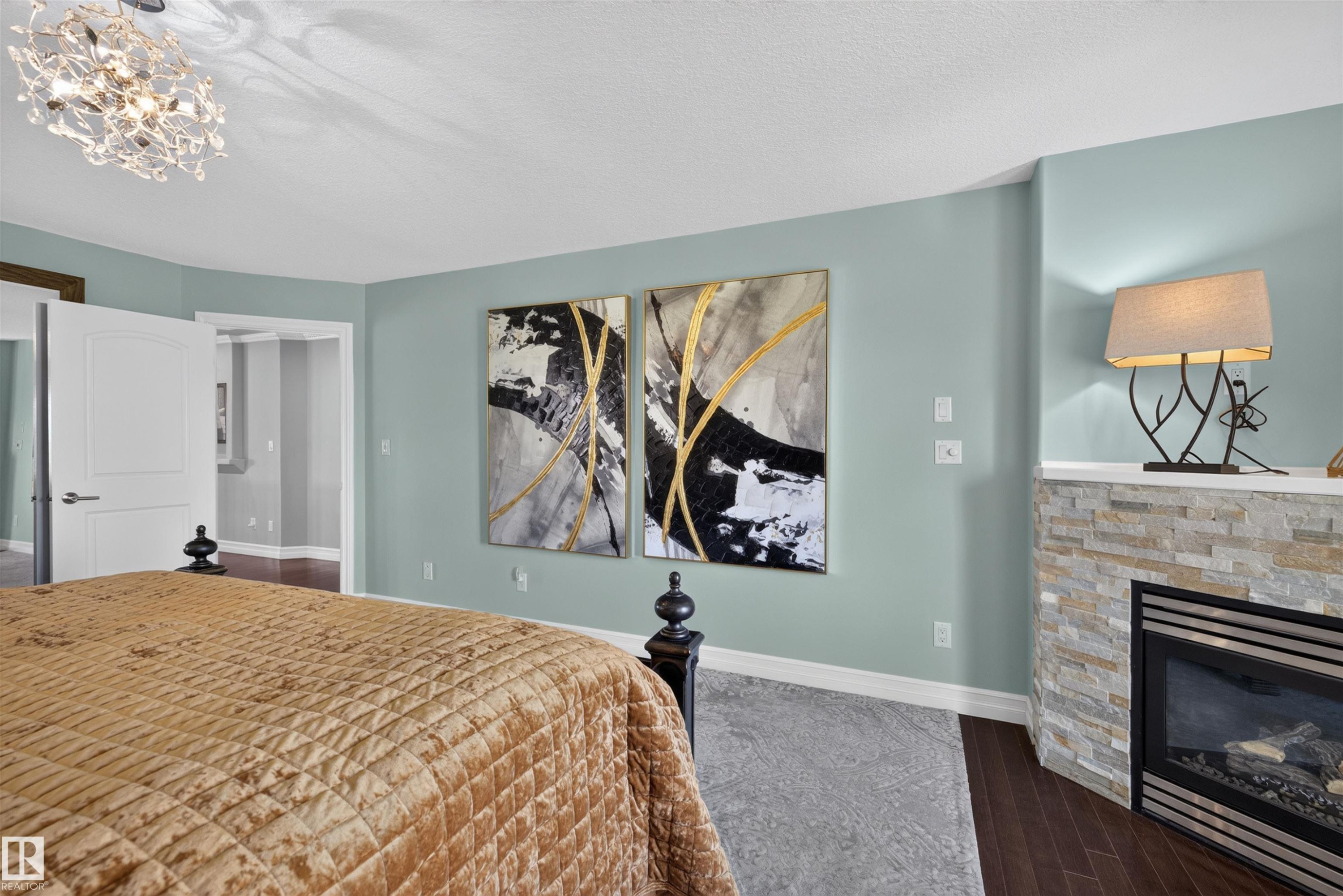 1751 Haswell Cove Nw, Edmonton, AB - Indoor Photo Showing Bedroom With Fireplace