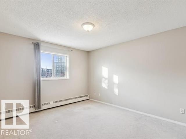 #267 10520 120 St Nw, Edmonton, AB - Indoor Photo Showing Other Room