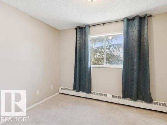 #267 10520 120 St Nw, Edmonton, AB - Indoor Photo Showing Other Room