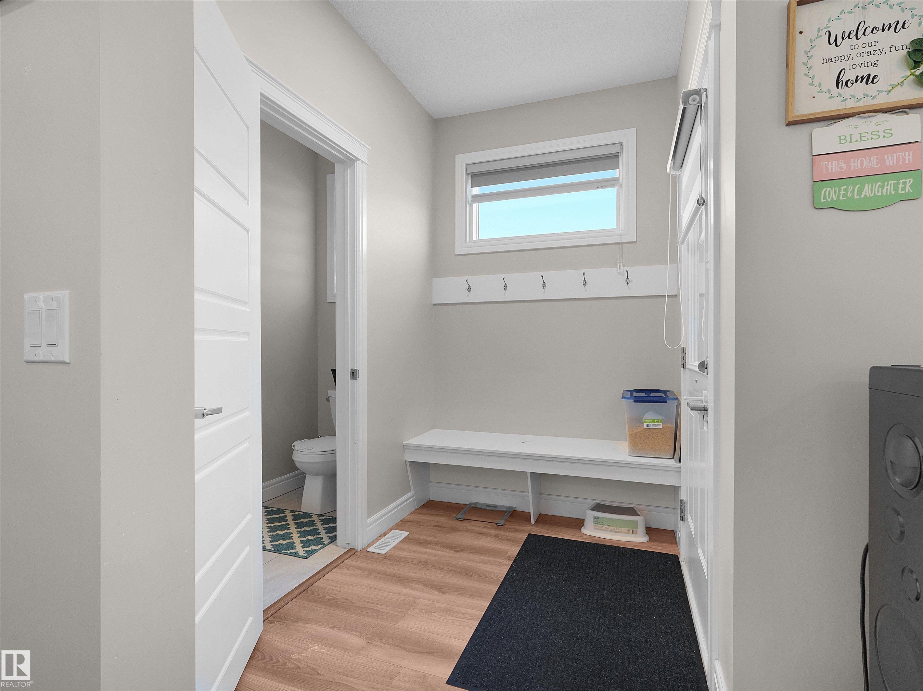 Functional entryway featuring wood-finish flooring - #30 4137 76 St Nw, Edmonton, AB