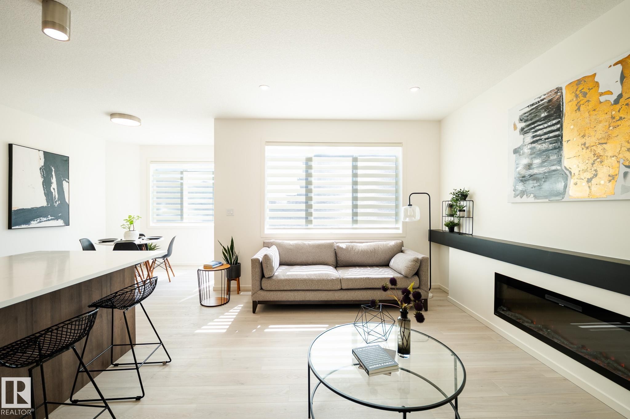 7705 174A Avenue, Edmonton, AB - Indoor Photo Showing Living Room With Fireplace