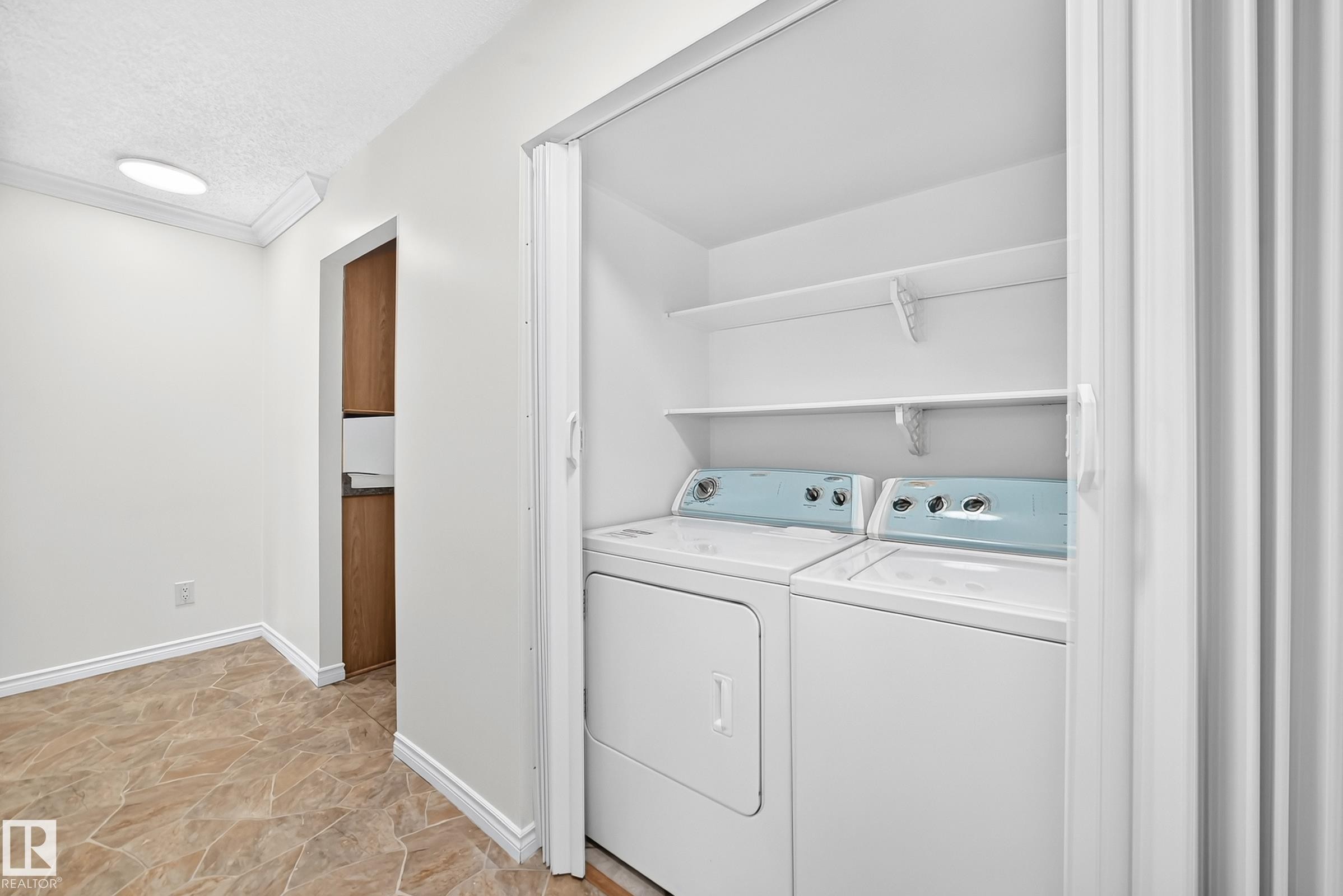 #40 3111 142 Av Nw, Edmonton, AB - Indoor Photo Showing Laundry Room