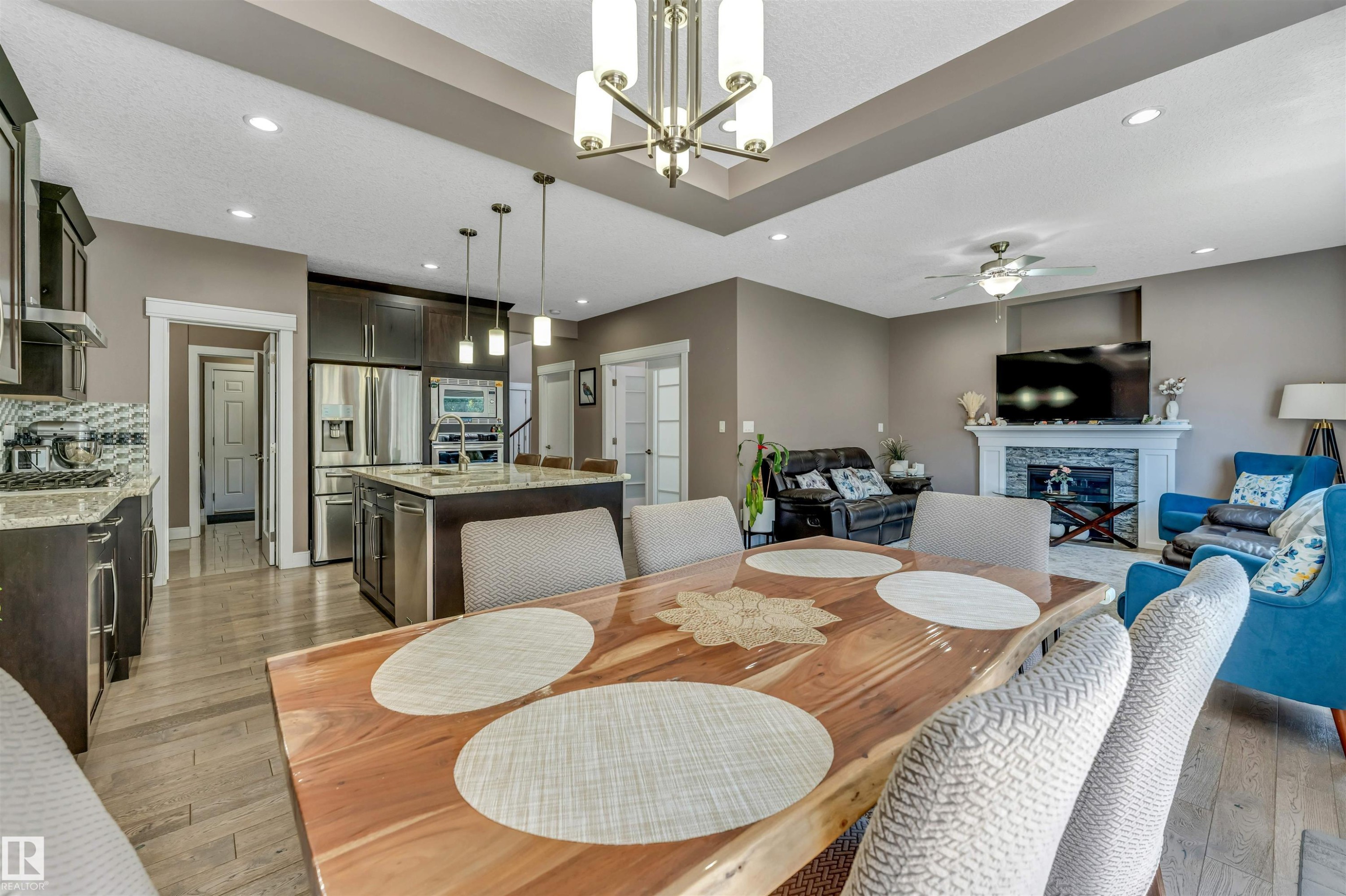 3819 Claxton Close Sw, Edmonton, AB - Indoor Photo Showing Dining Room With Fireplace