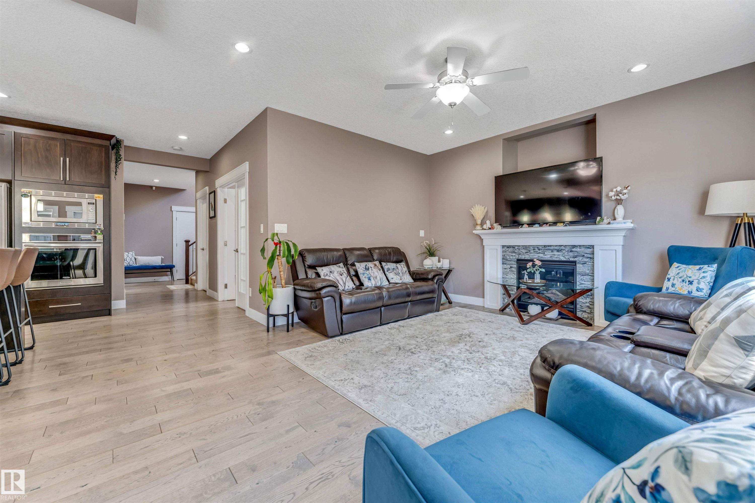 3819 Claxton Close Sw, Edmonton, AB - Indoor Photo Showing Living Room With Fireplace