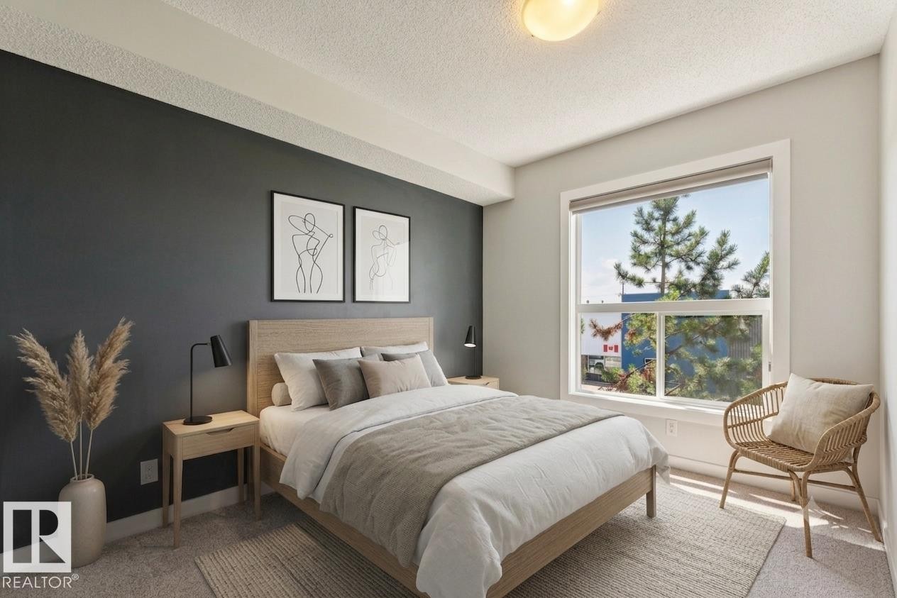 #217 10523 123 St Nw, Edmonton, AB - Indoor Photo Showing Bedroom
