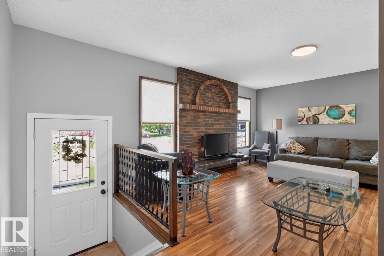 2408 80 Street Nw, Edmonton, AB - Indoor Photo Showing Living Room With Fireplace