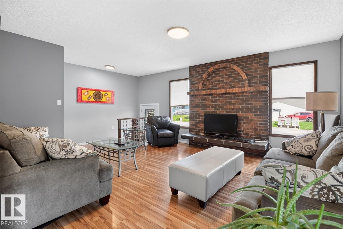 2408 80 Street Nw, Edmonton, AB - Indoor Photo Showing Living Room With Fireplace