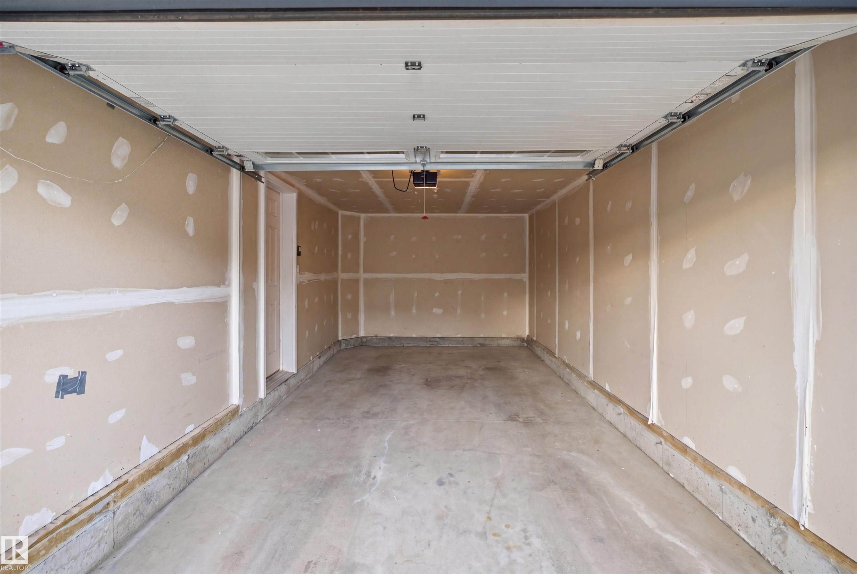2284 Chokecherry Close Sw, Edmonton, AB - Indoor Photo Showing Garage