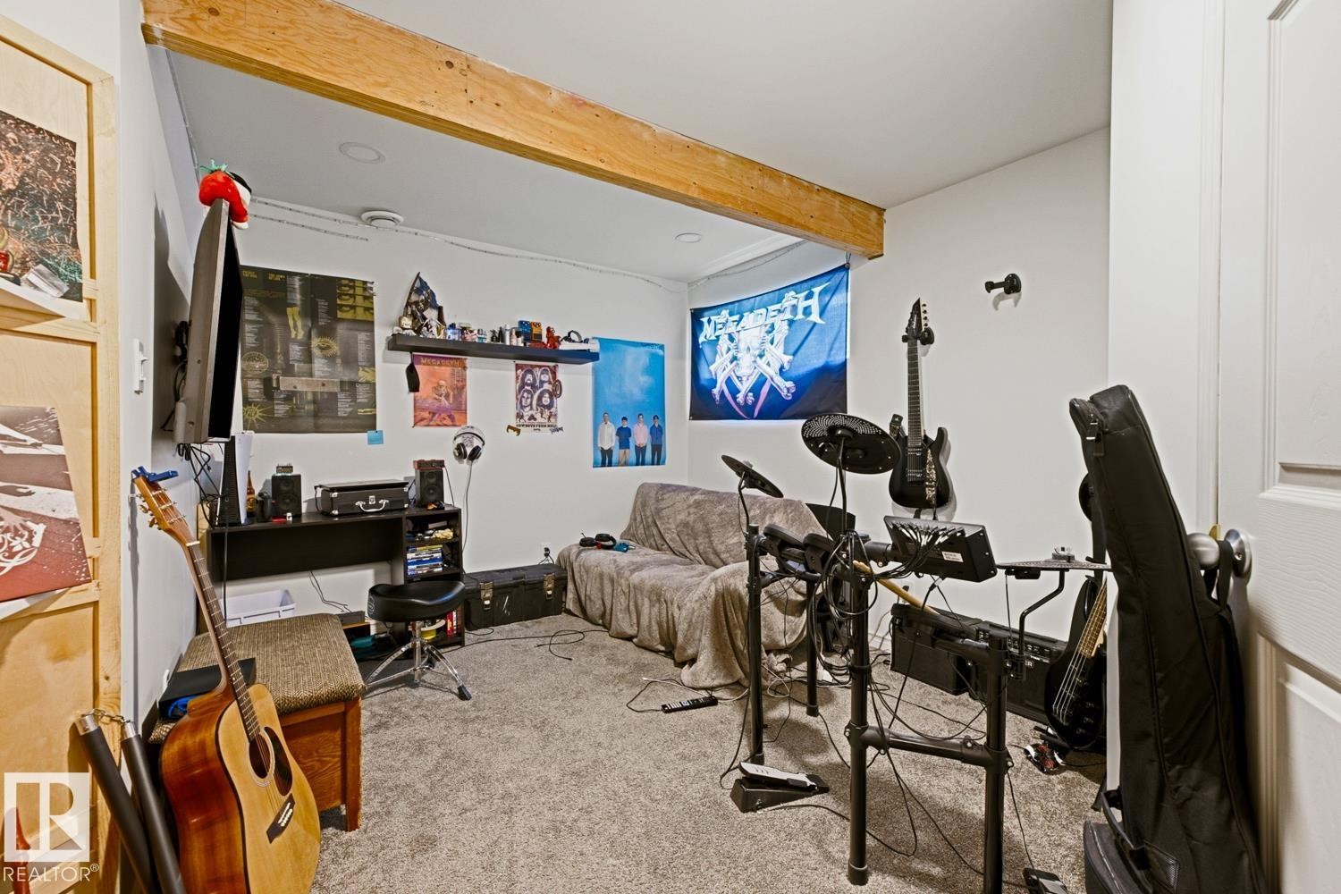 Room featuring exposed wood beams, recessed lighting, white walls, and gray carpeting - 3724 163 Avenue Nw, Edmonton, AB - Indoor