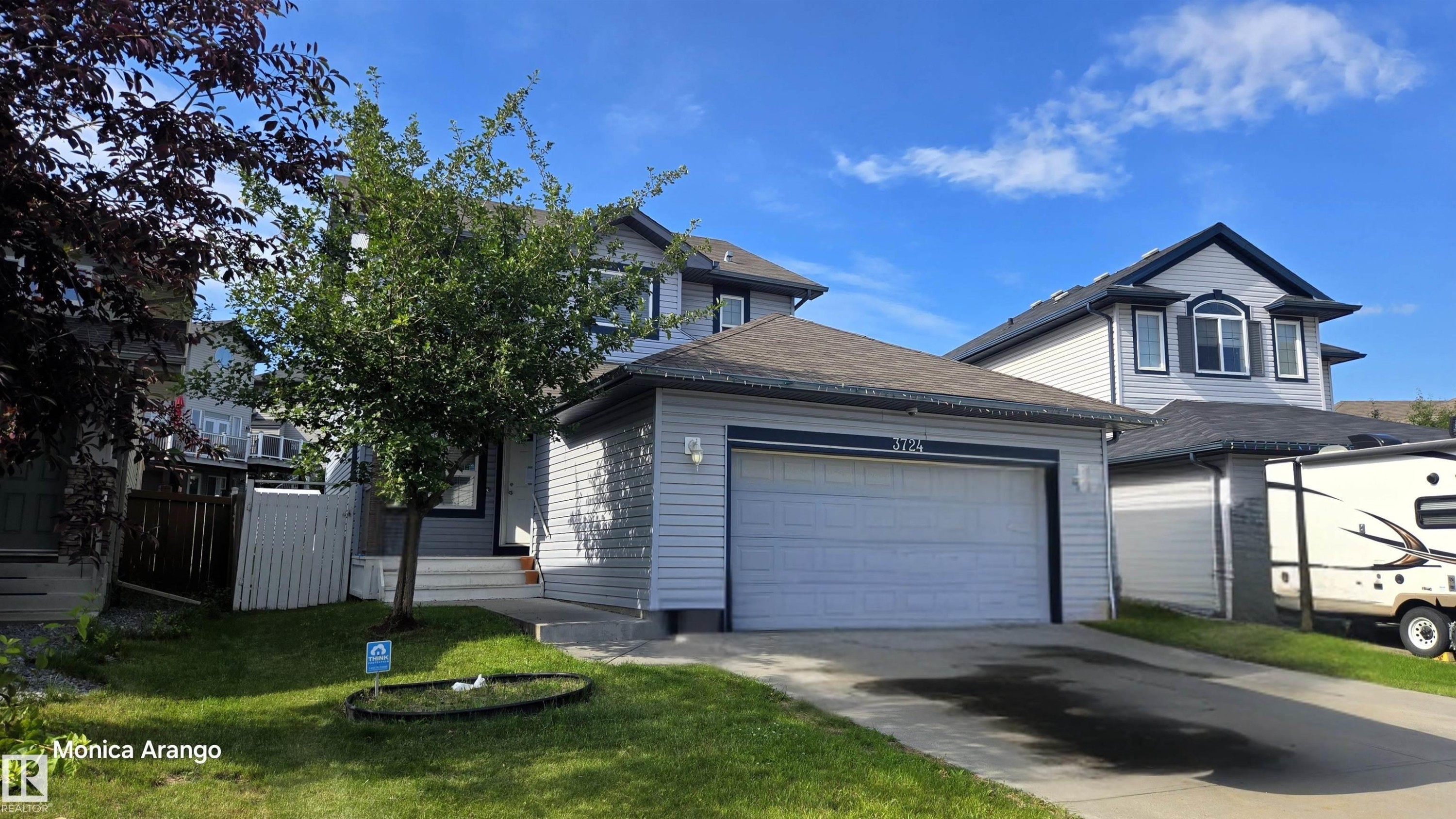 Two-story property with light gray siding and dark trim accents - 3724 163 Avenue Nw, Edmonton, AB - Outdoor