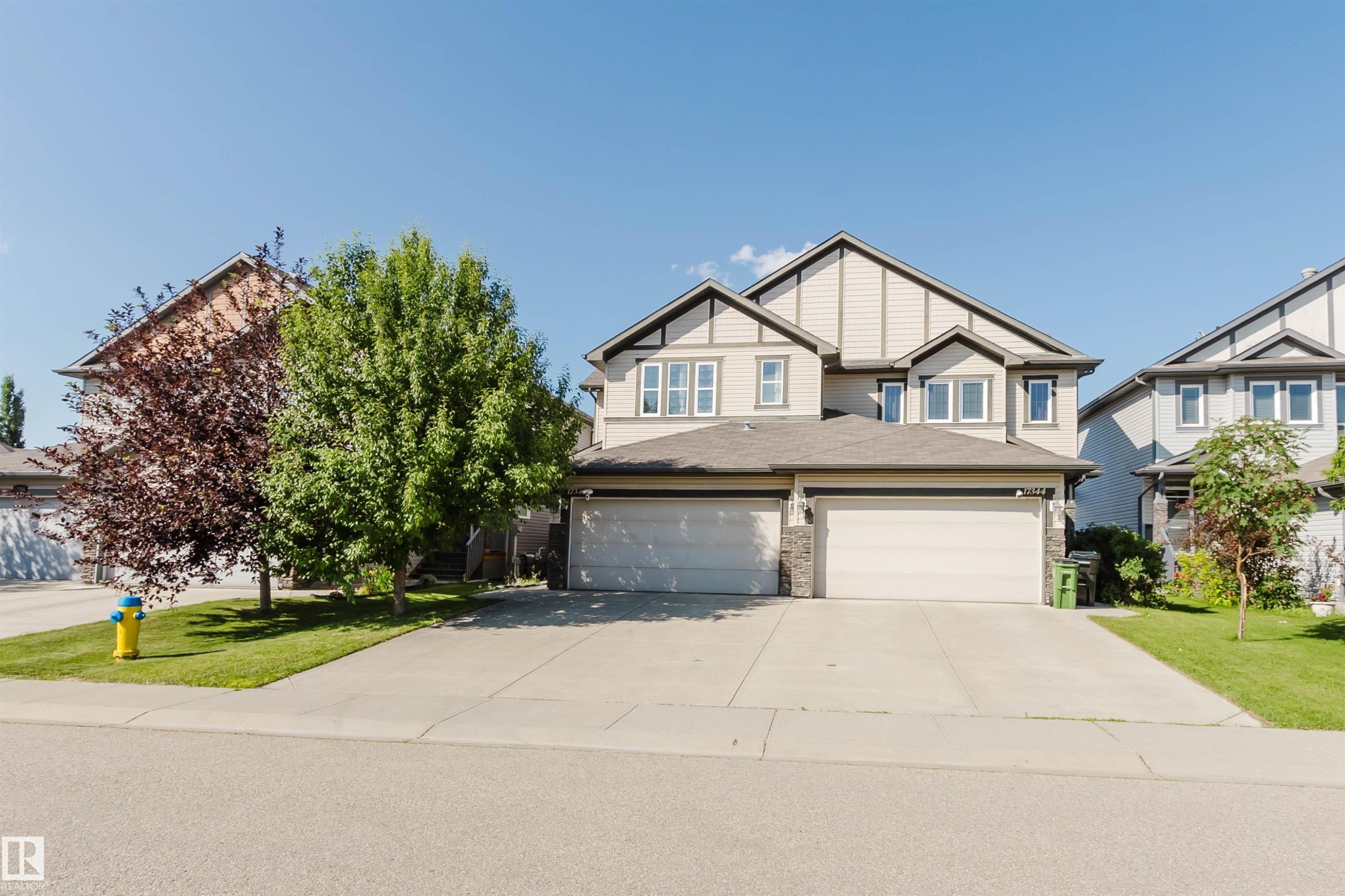 Contemporary two-story residence featuring a dual garage and a neutral exterior color palette - 17348 6 Avenue Sw, Edmonton, AB - Outdoor With Facade