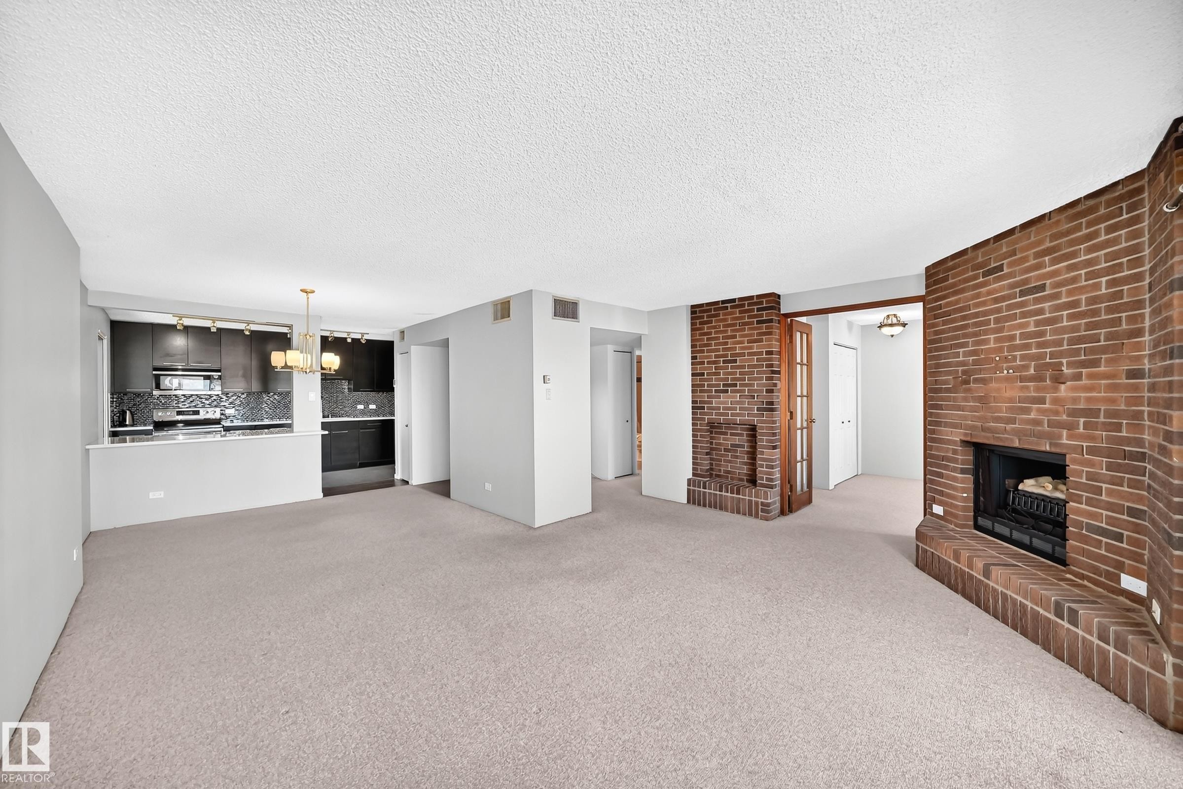 #1802 11027 87 Av Nw, Edmonton, AB - Indoor With Fireplace