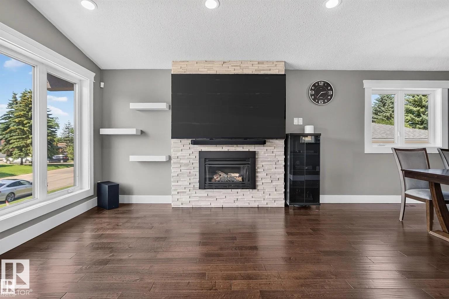 3911 67 Street Nw, Edmonton, AB - Indoor Photo Showing Living Room With Fireplace