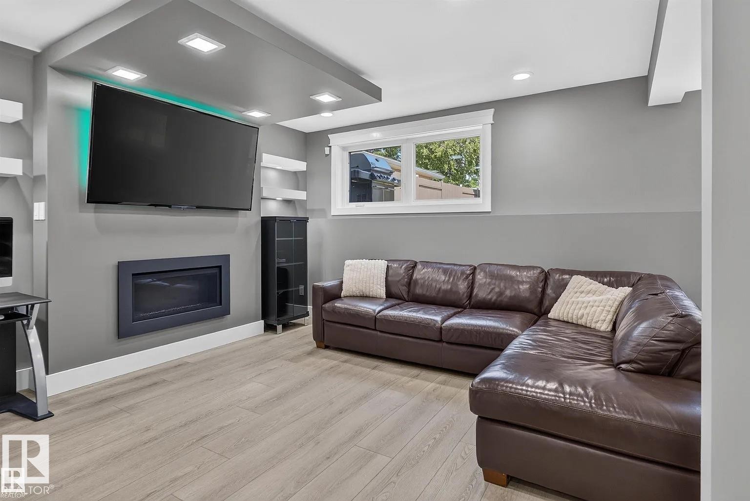 3911 67 Street Nw, Edmonton, AB - Indoor Photo Showing Living Room With Fireplace