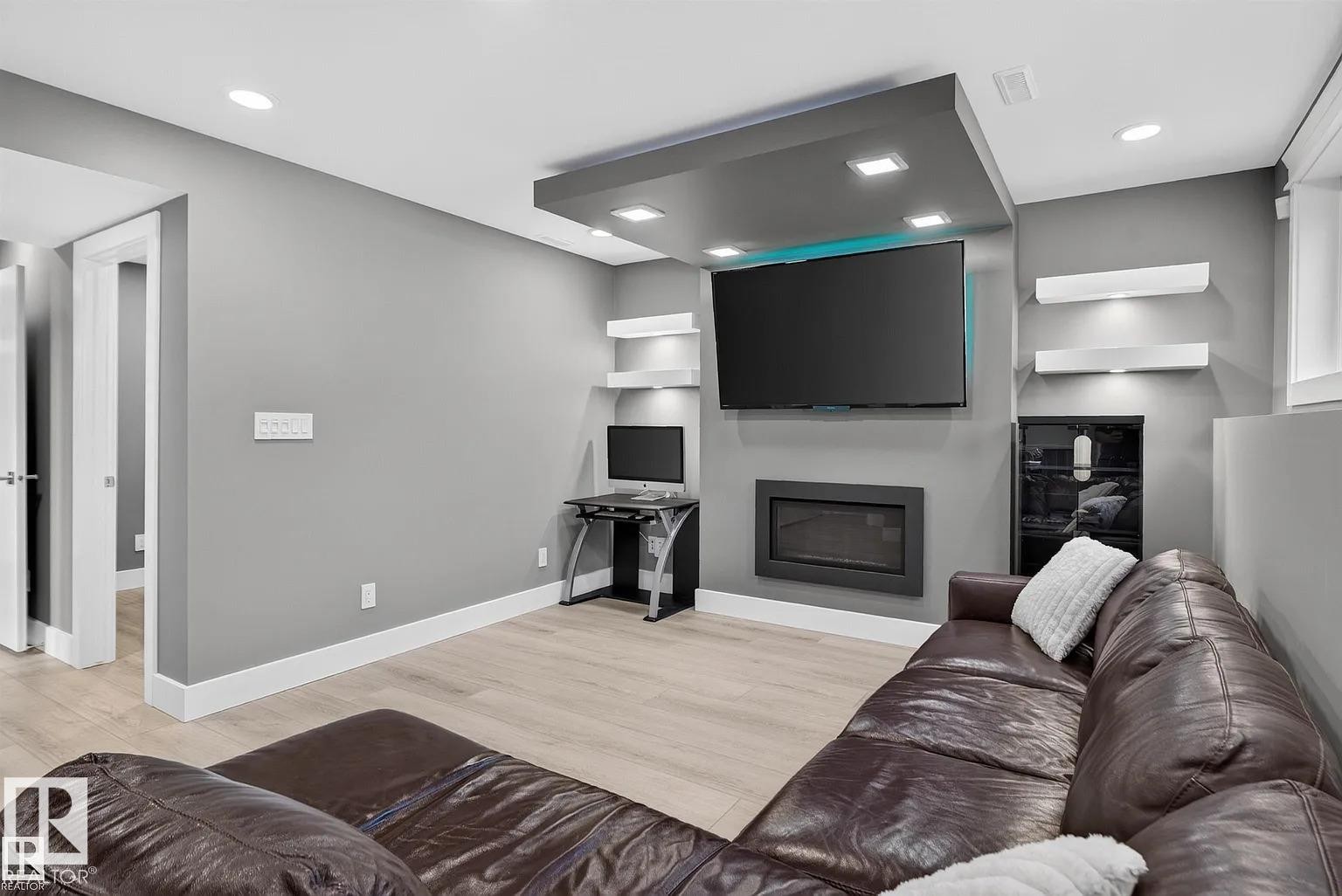 3911 67 Street Nw, Edmonton, AB - Indoor Photo Showing Living Room With Fireplace