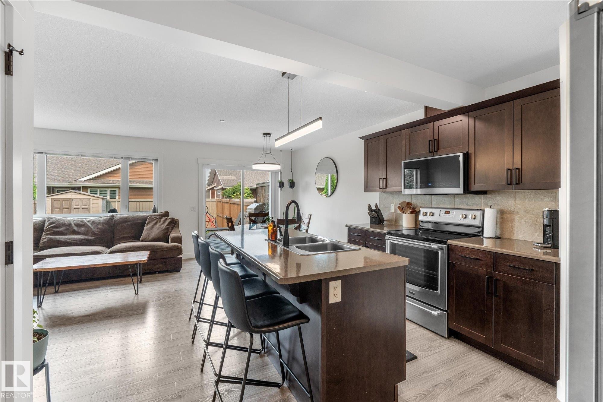 148 Brickyard Place, Stony Plain, AB - Indoor Photo Showing Kitchen With Double Sink