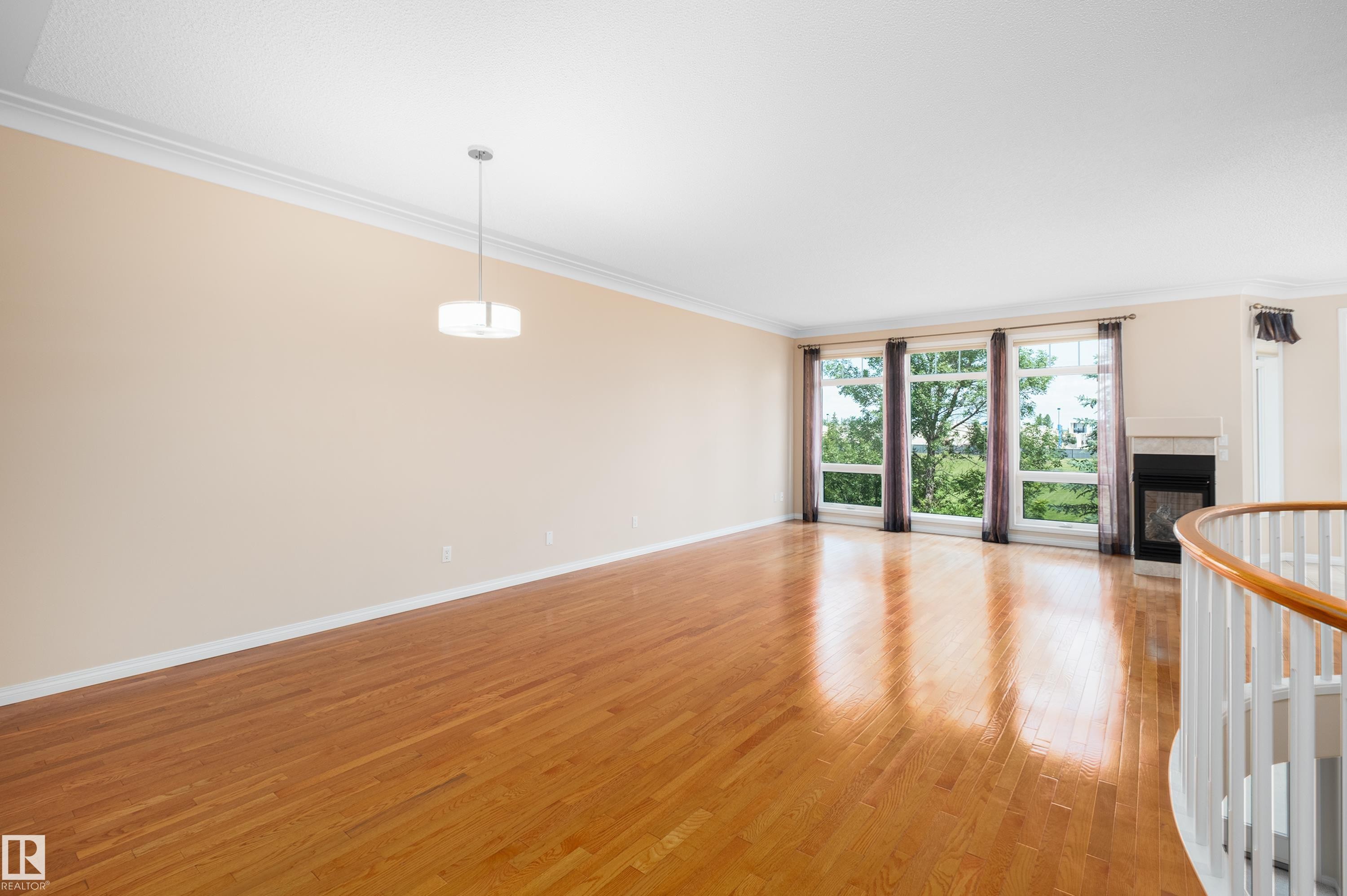 434 Tory Point(E) Nw, Edmonton, AB - Indoor With Fireplace
