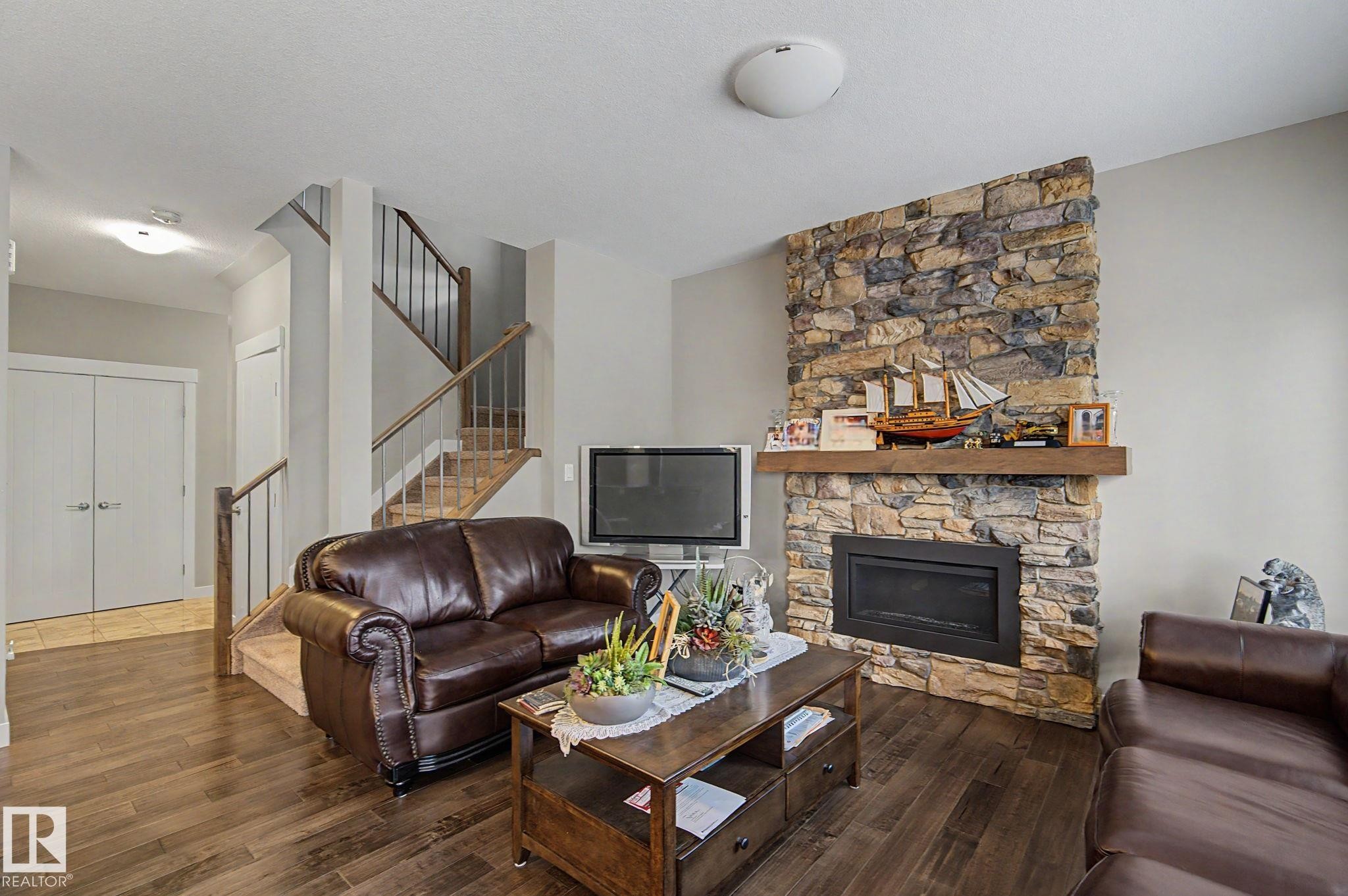 8005 223 Street Nw, Edmonton, AB - Indoor Photo Showing Living Room With Fireplace
