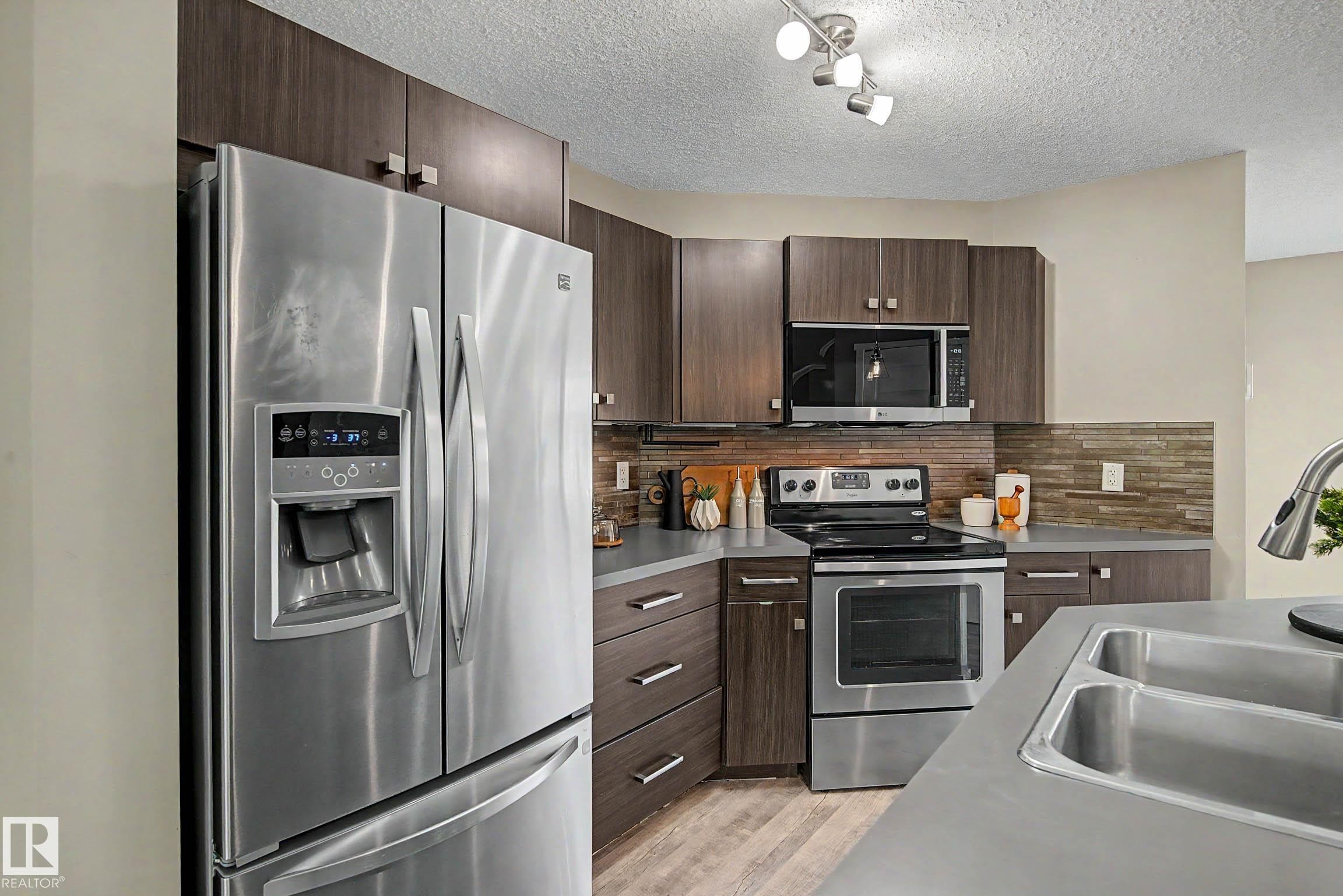 4218 Allan Link Link Sw, Edmonton, AB - Indoor Photo Showing Kitchen With Double Sink