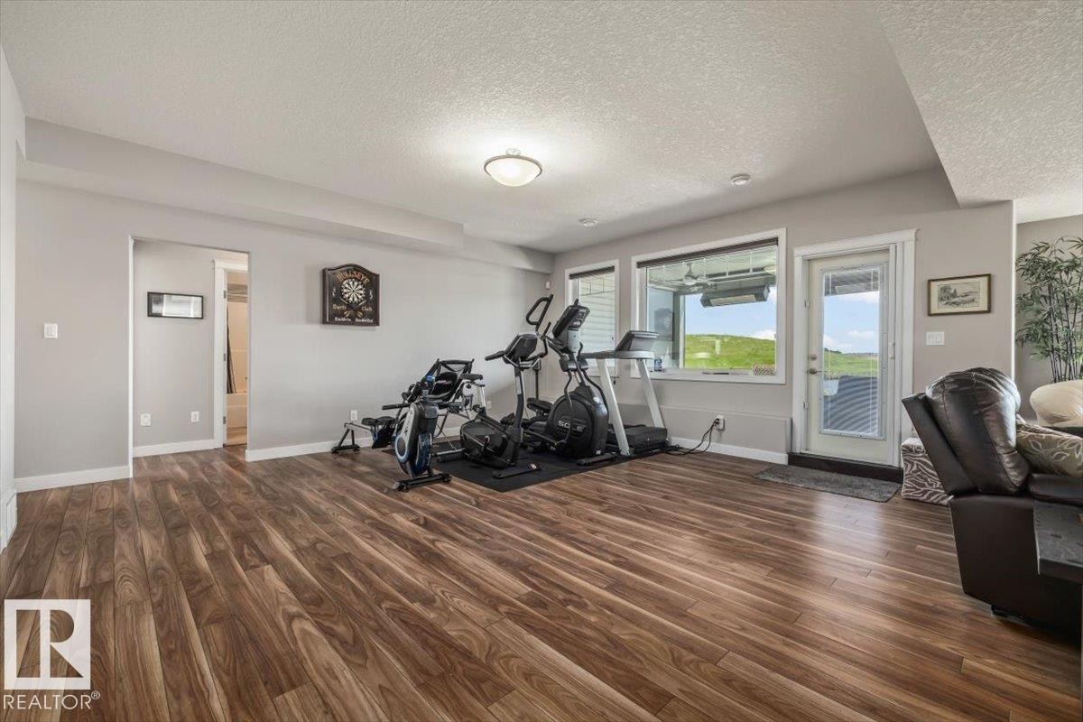 87 Lakeland Crescent, Beaumont, AB - Indoor Photo Showing Gym Room